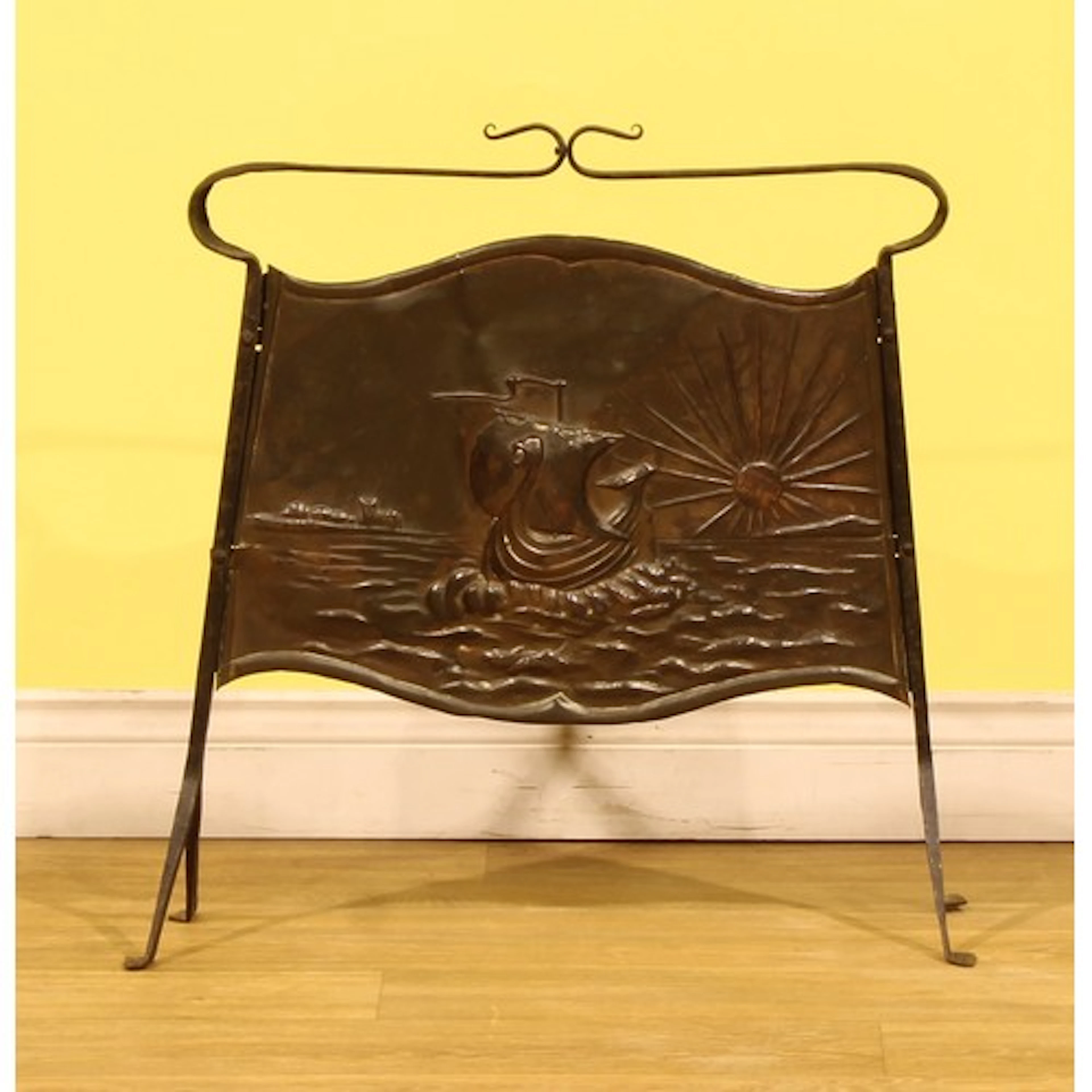 An Arts & Crafts period Newlyn School wrought iron and coppe...
