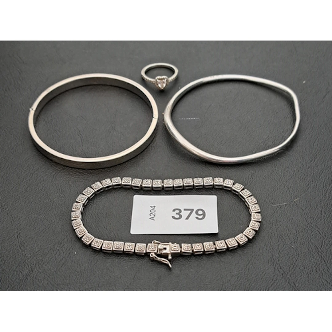 FOUR PIECES OF SILVER JEWELLERY comprising a Georg Jensen Of...