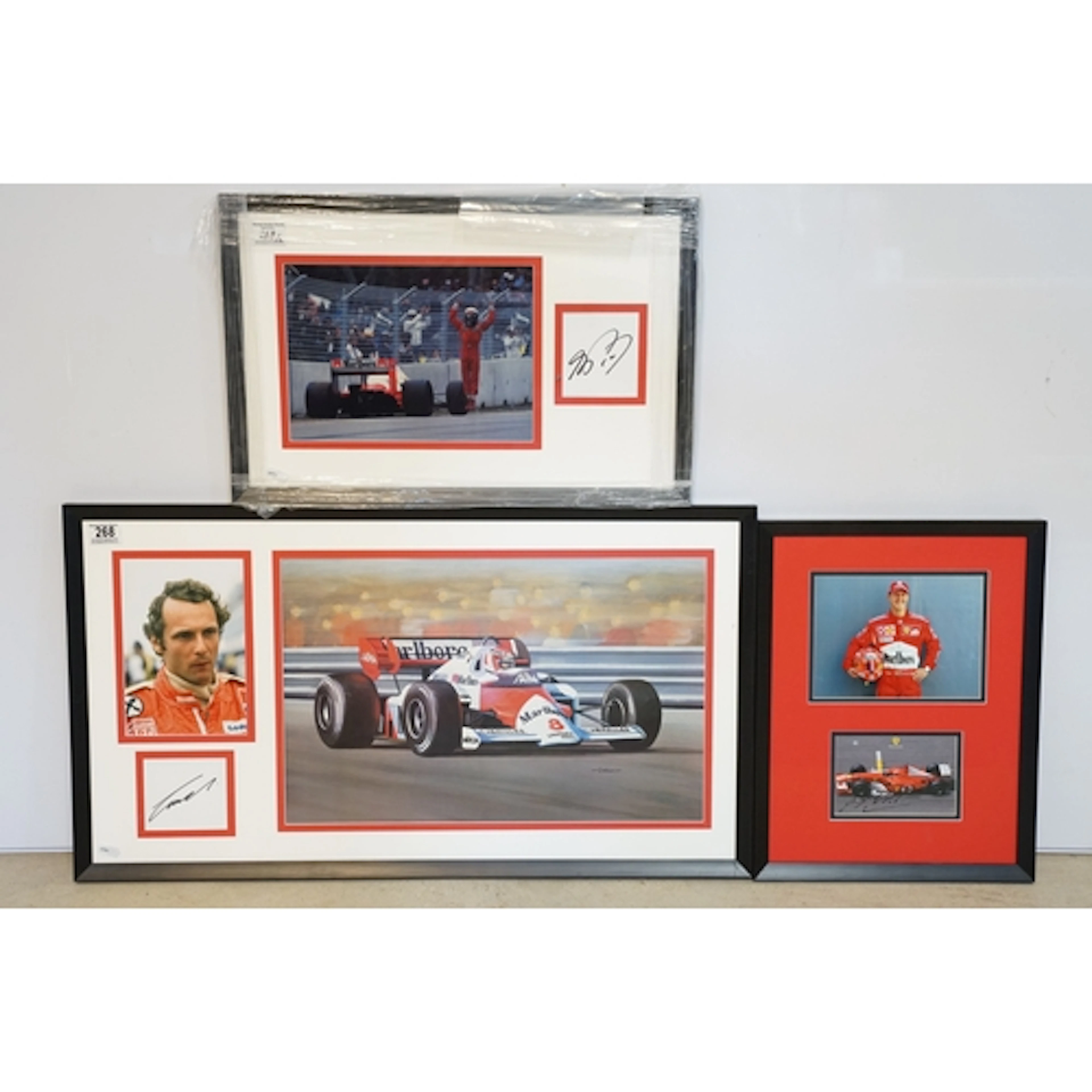 A collection of three framed and glazed Motor Sport related ...