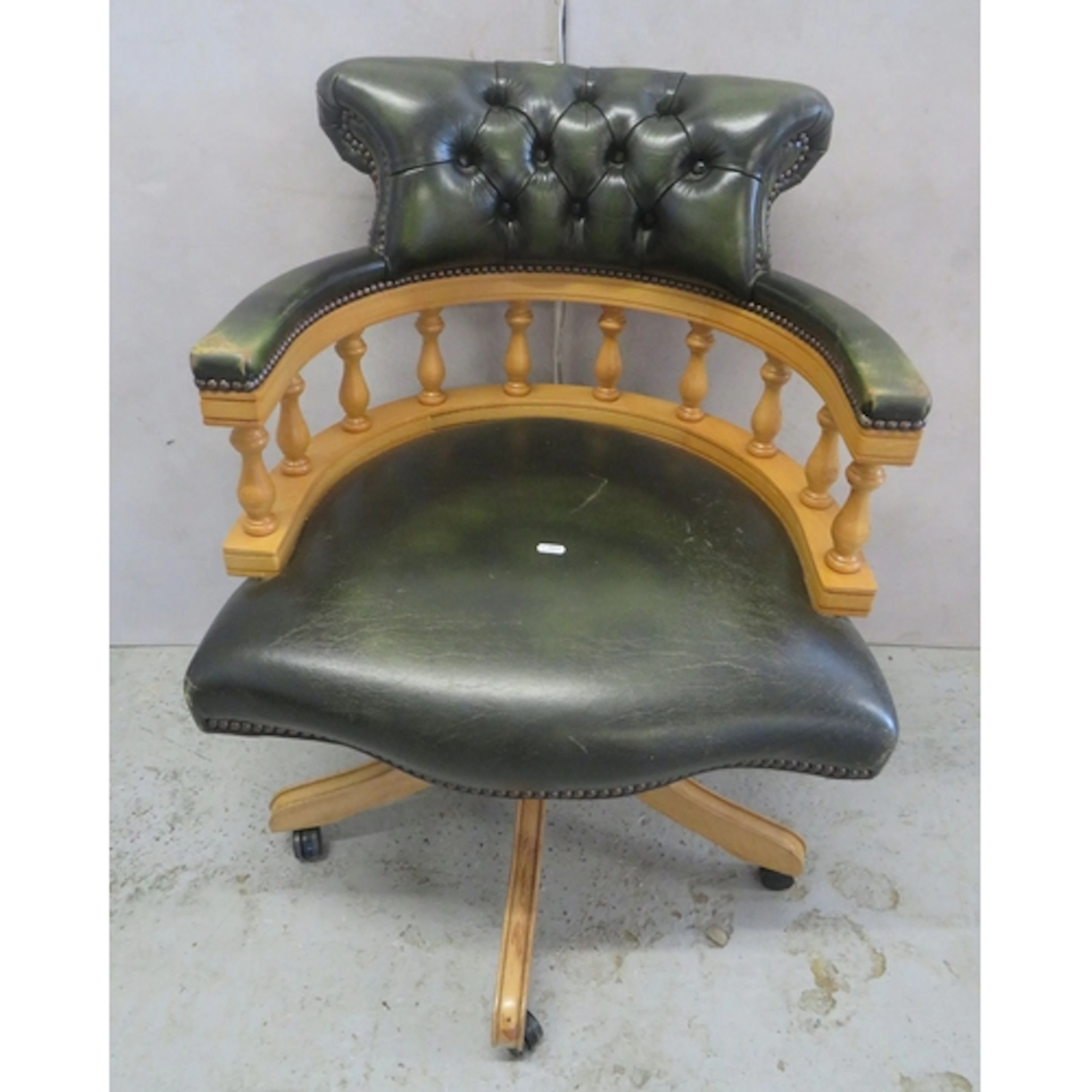 Antique Style Captains Chair with green leather deep buttone...