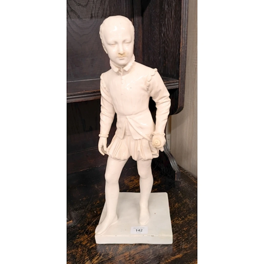 A continental white glazed figure of Henry III, standing app...