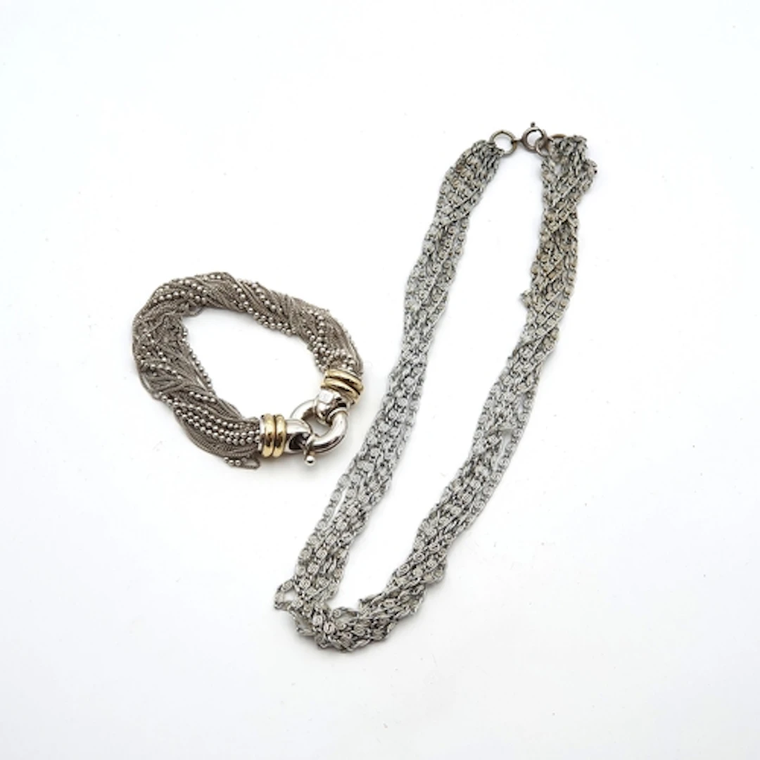 A multi-strand chain Necklace stamped 925 and a multi-strand...