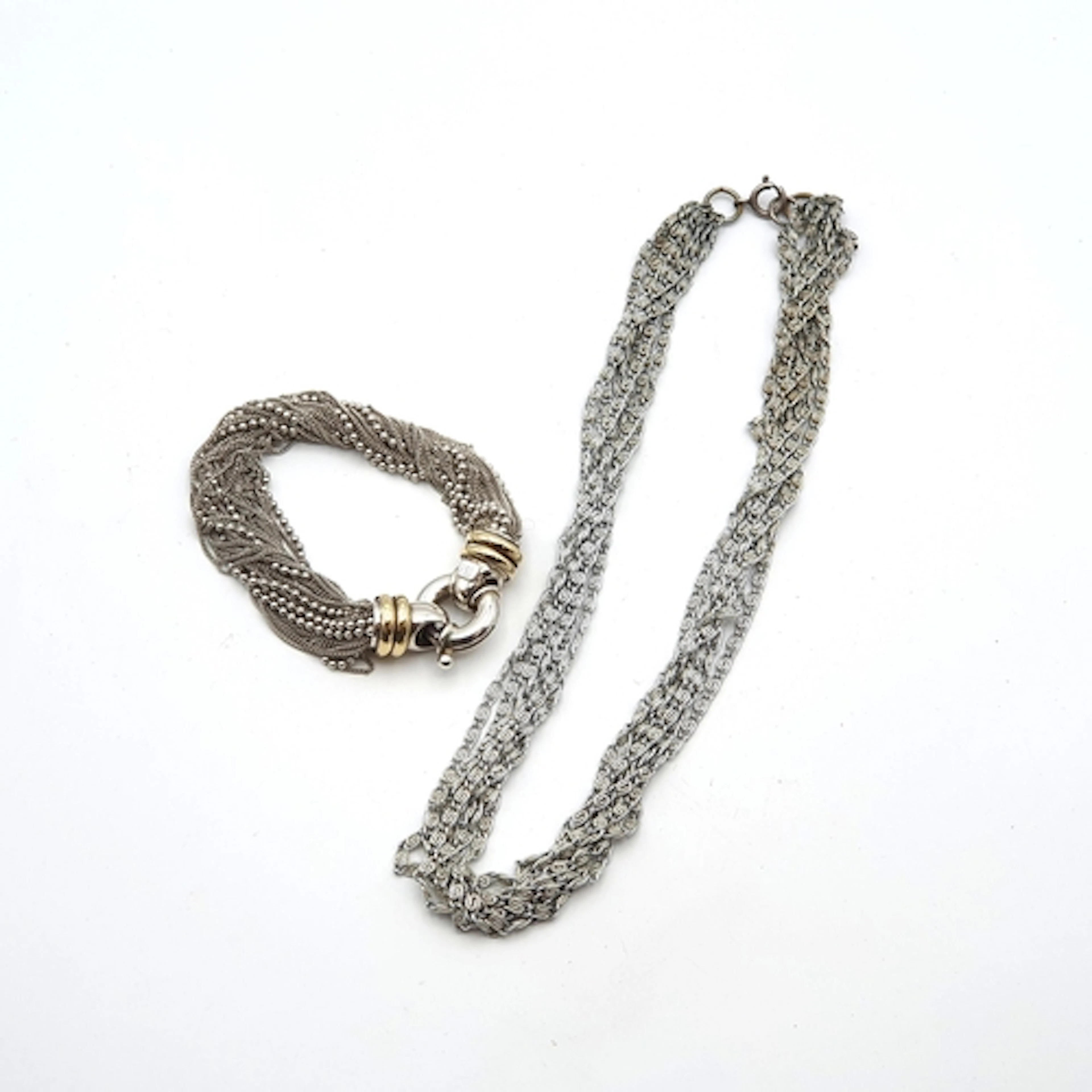 A multi-strand chain Necklace stamped 925 and a multi-strand...