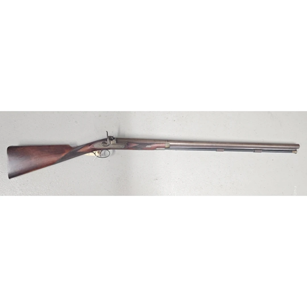 A 12 bore percussion sporting gun by GRIFFITHS & WORSLEY...