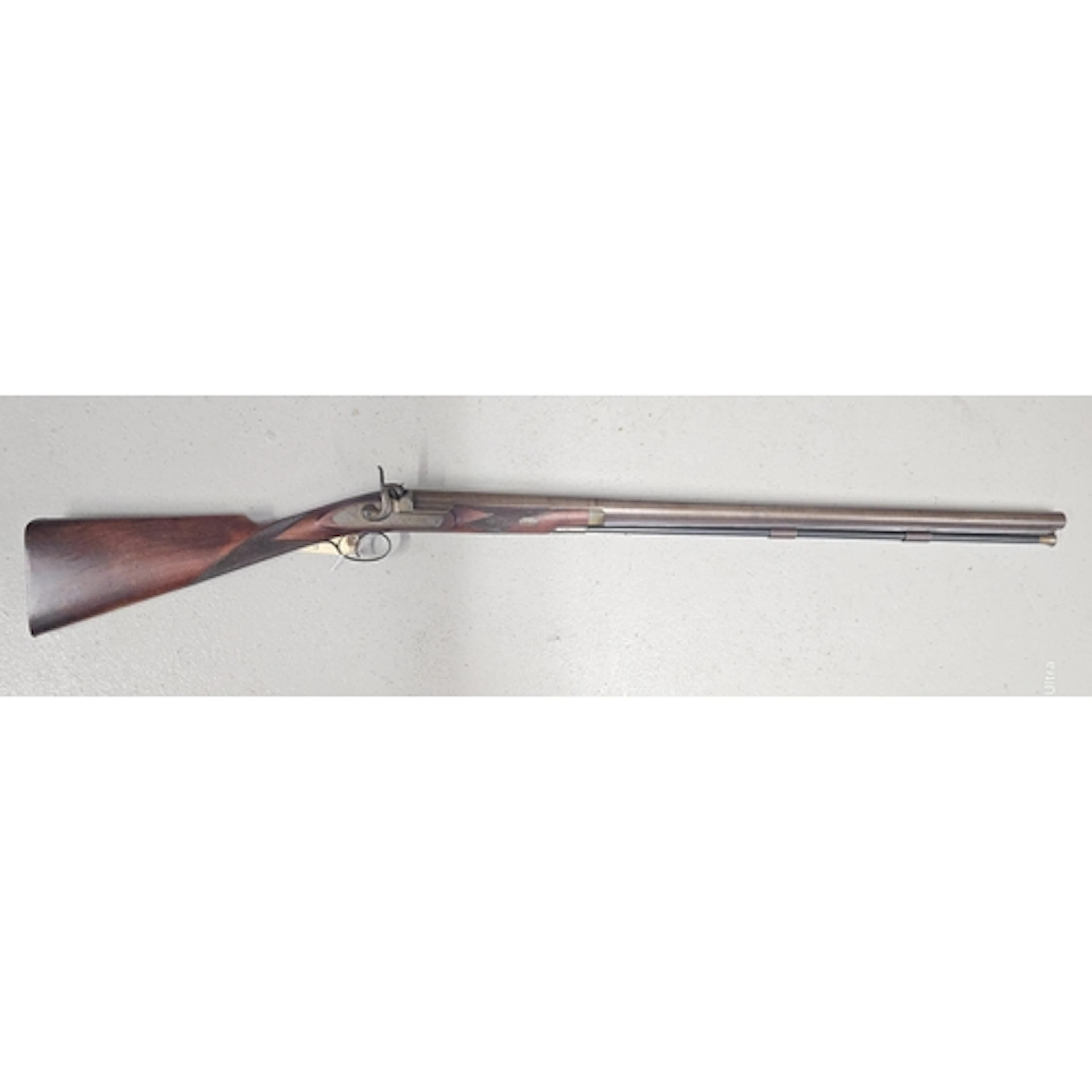 A 12 bore percussion sporting gun by GRIFFITHS & WORSLEY...