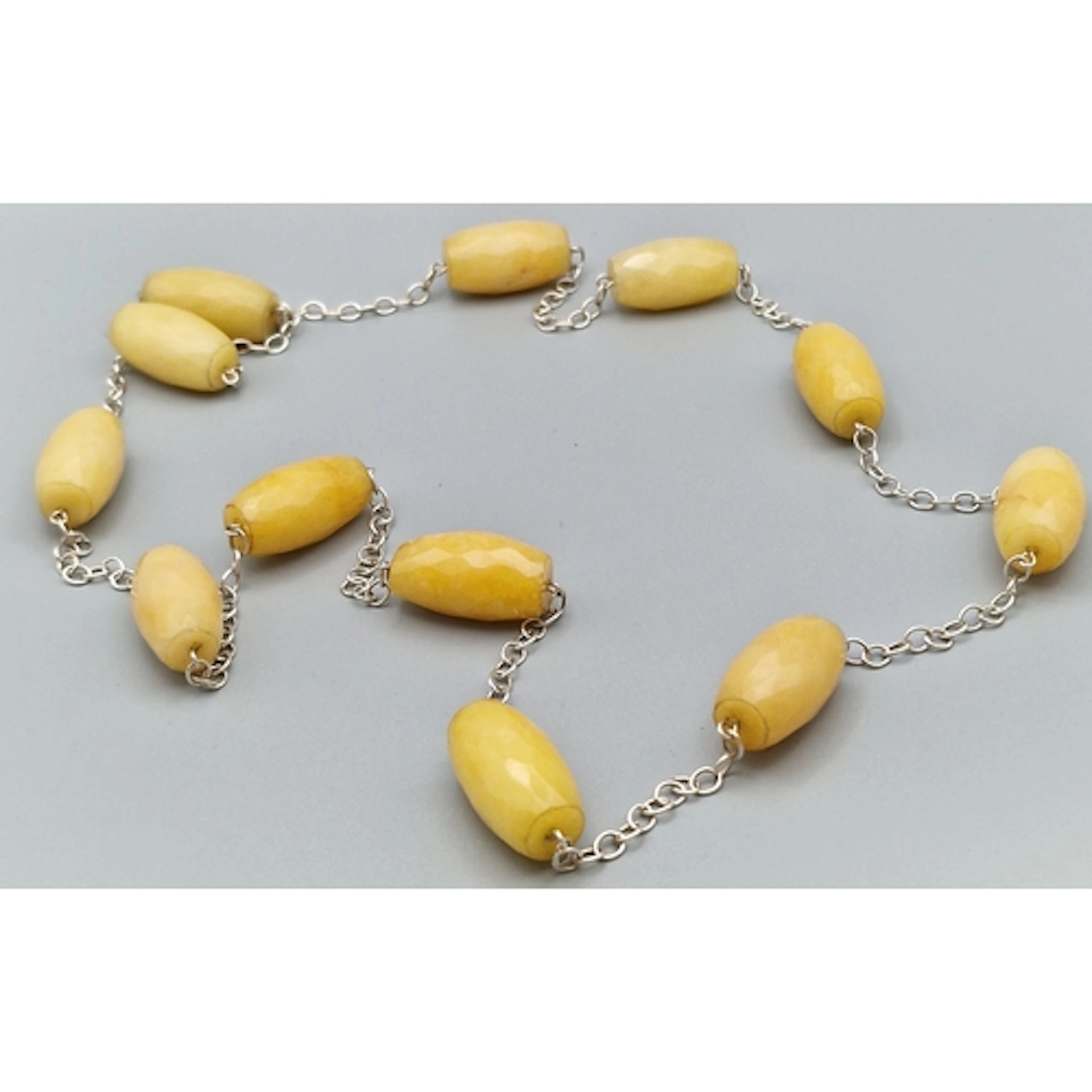 Vintage yellow butterscotch type beaded necklace on a sterli...
