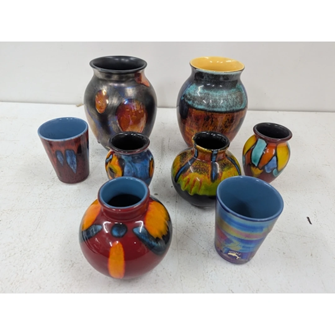 Poole pottery to include six vases and two Beckers to includ...