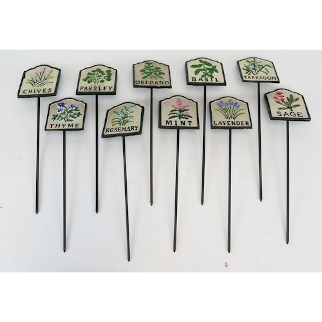 Quantity of cast iron garden herb markers including Rosemary...