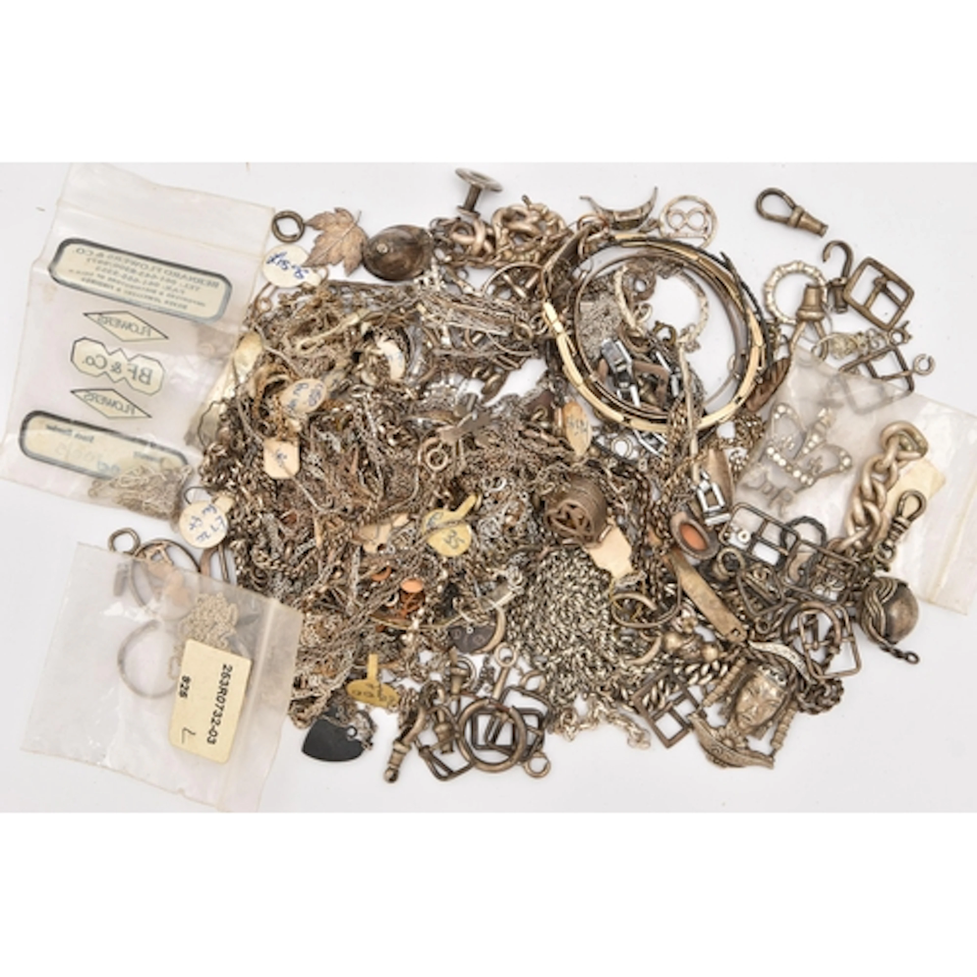 A BAG OF ASSORTED SILVER AND WHITE METAL JEWELLERY, to inclu...