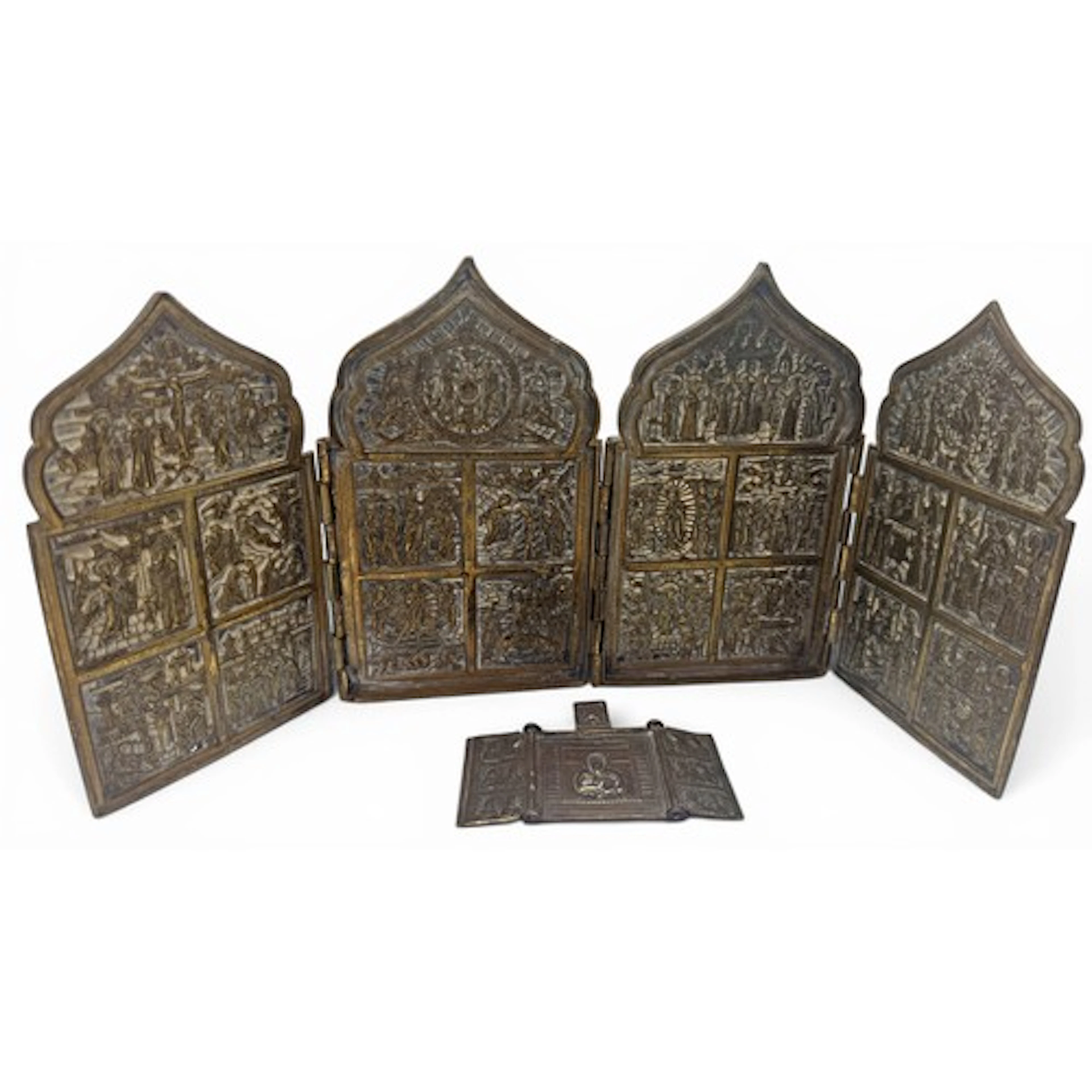 A Russian brass travelling tetraptych folding icon, each hin...
