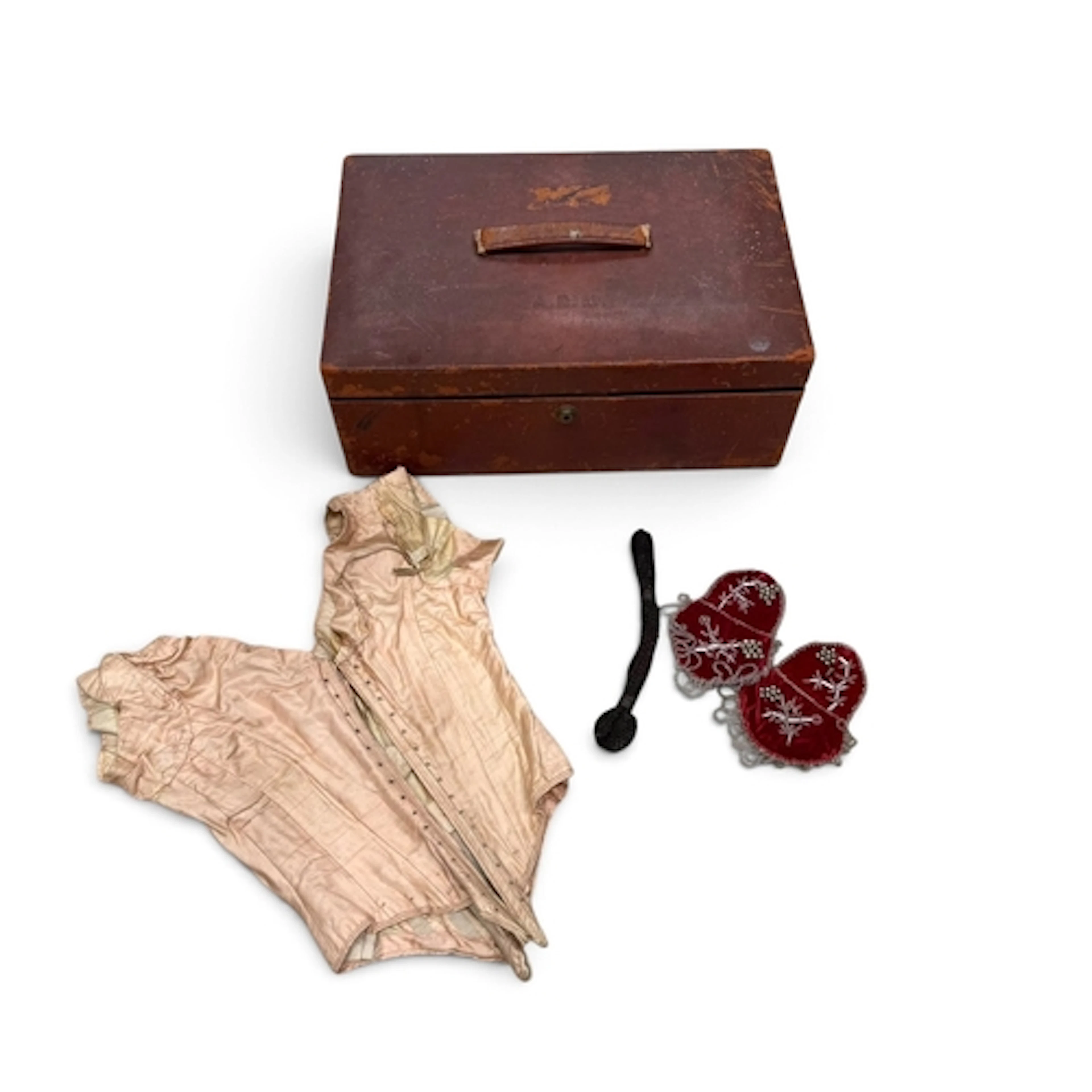 A VICTORIAN PINK SILK CORSET, A MISER'S PURSE AND A PAIR OF ...