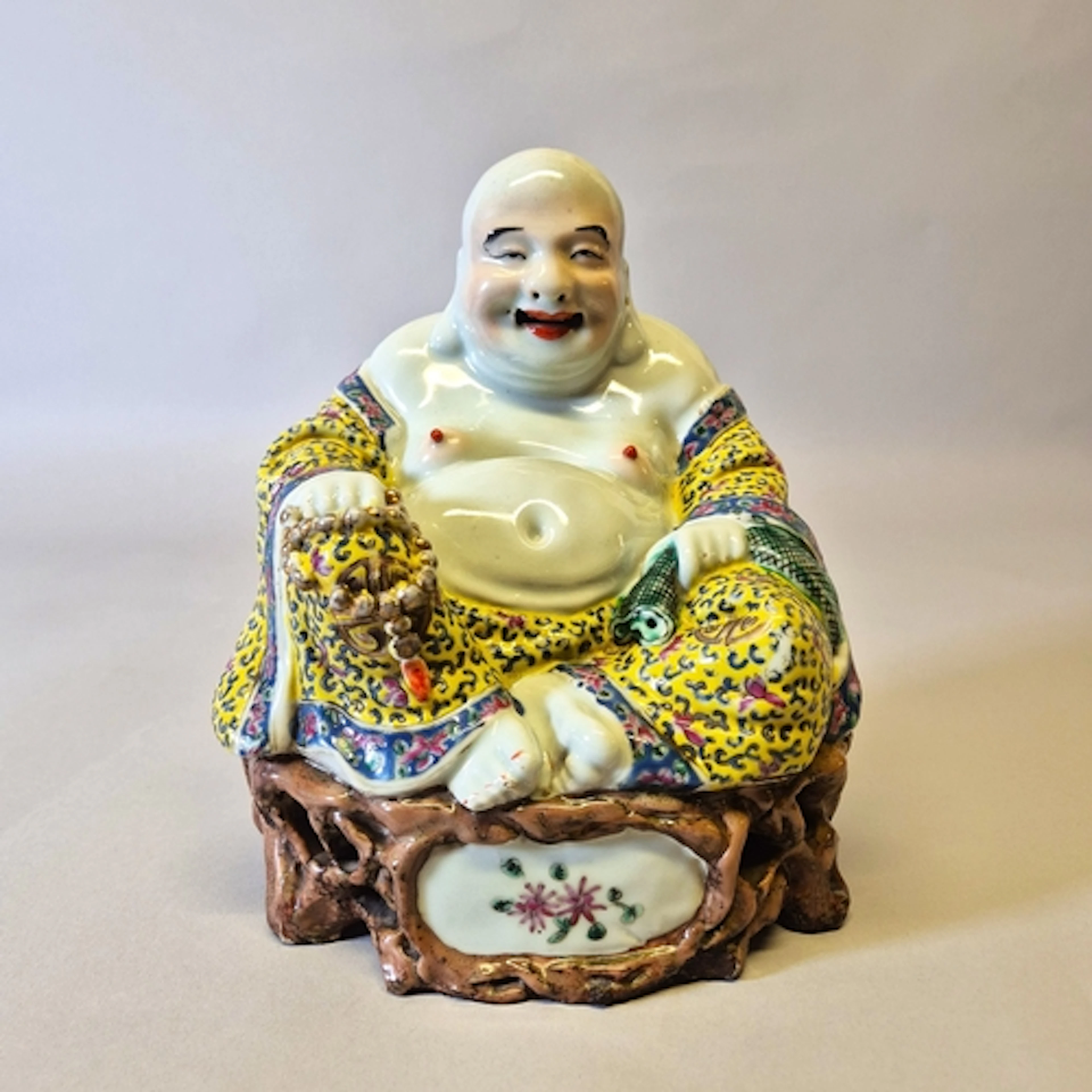 Chinese famille rose pottery figure modelled as The Laughing...