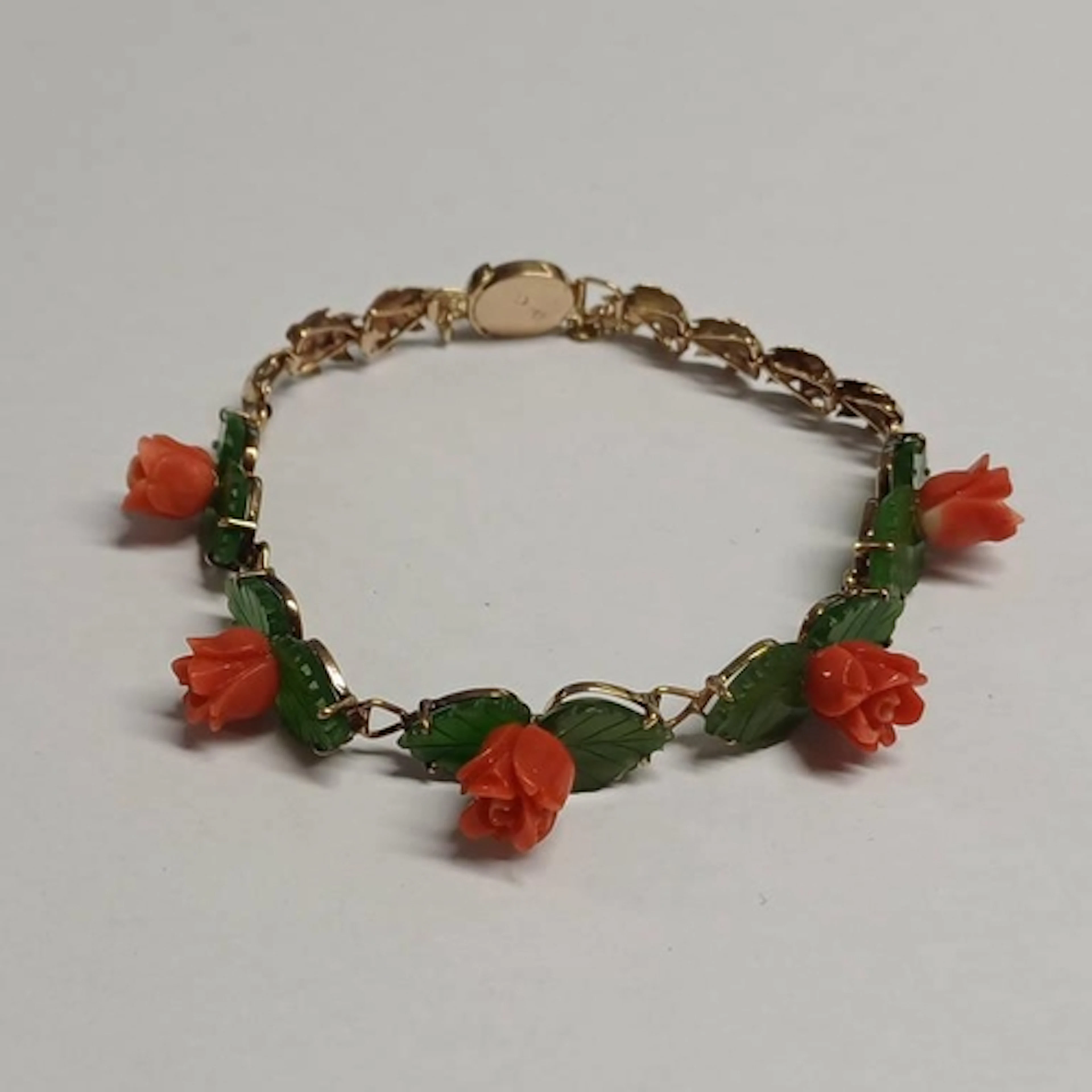 GOLD FLORAL CARVED CORAL & NEPHRITE BRACELET - 17CM LONG, 9....