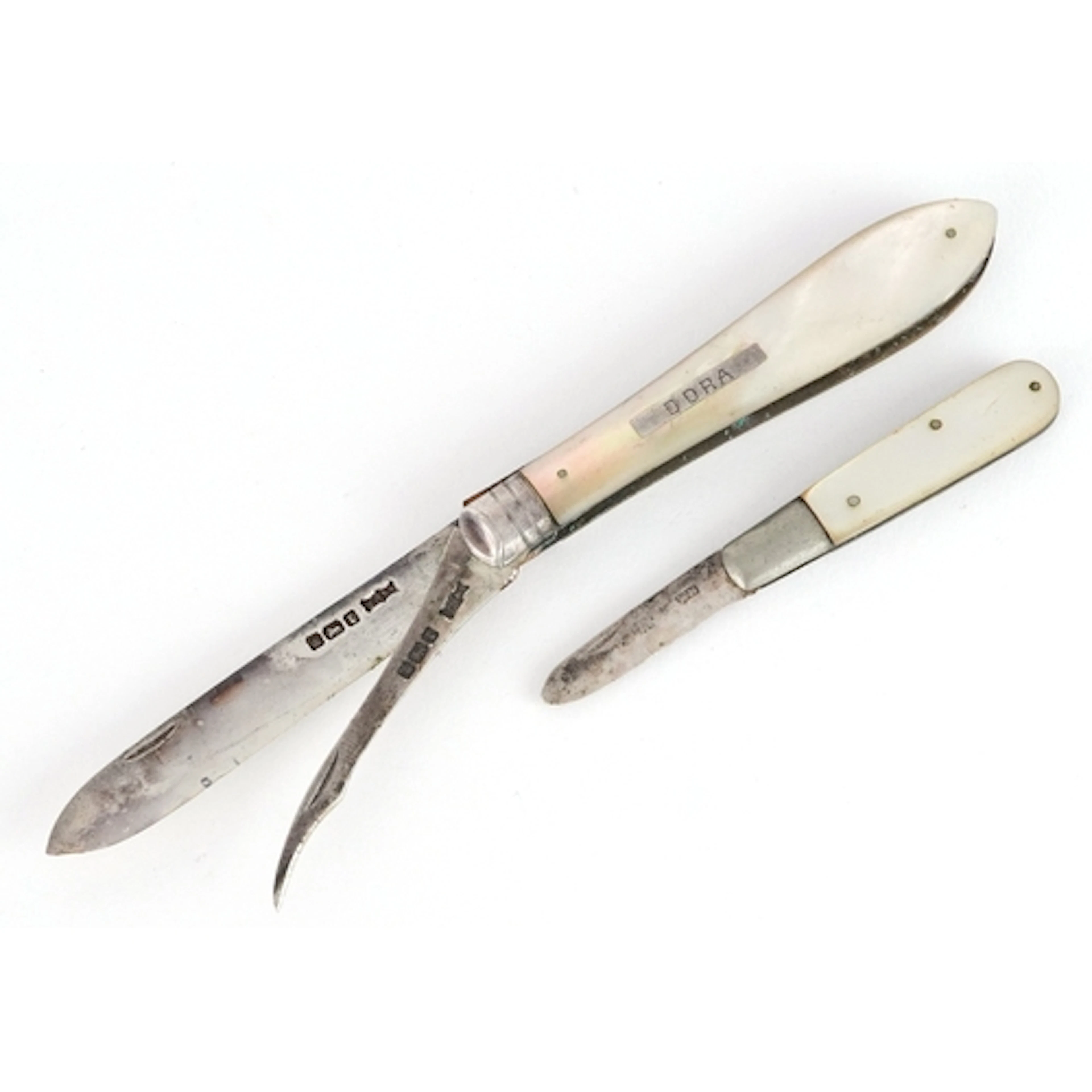 Two early 20th century silver and mother of pearl folding po...