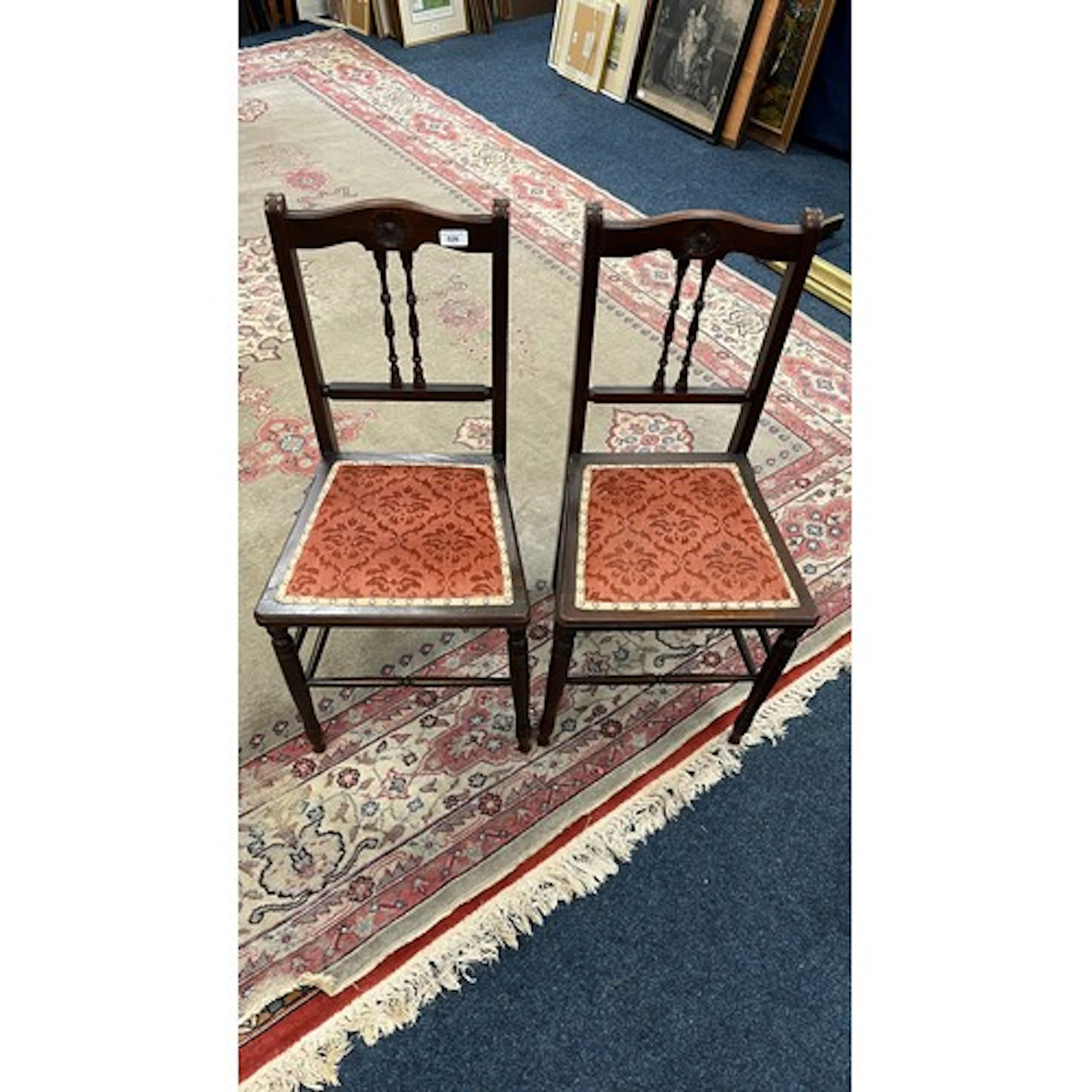 Two upholstered dining chairs