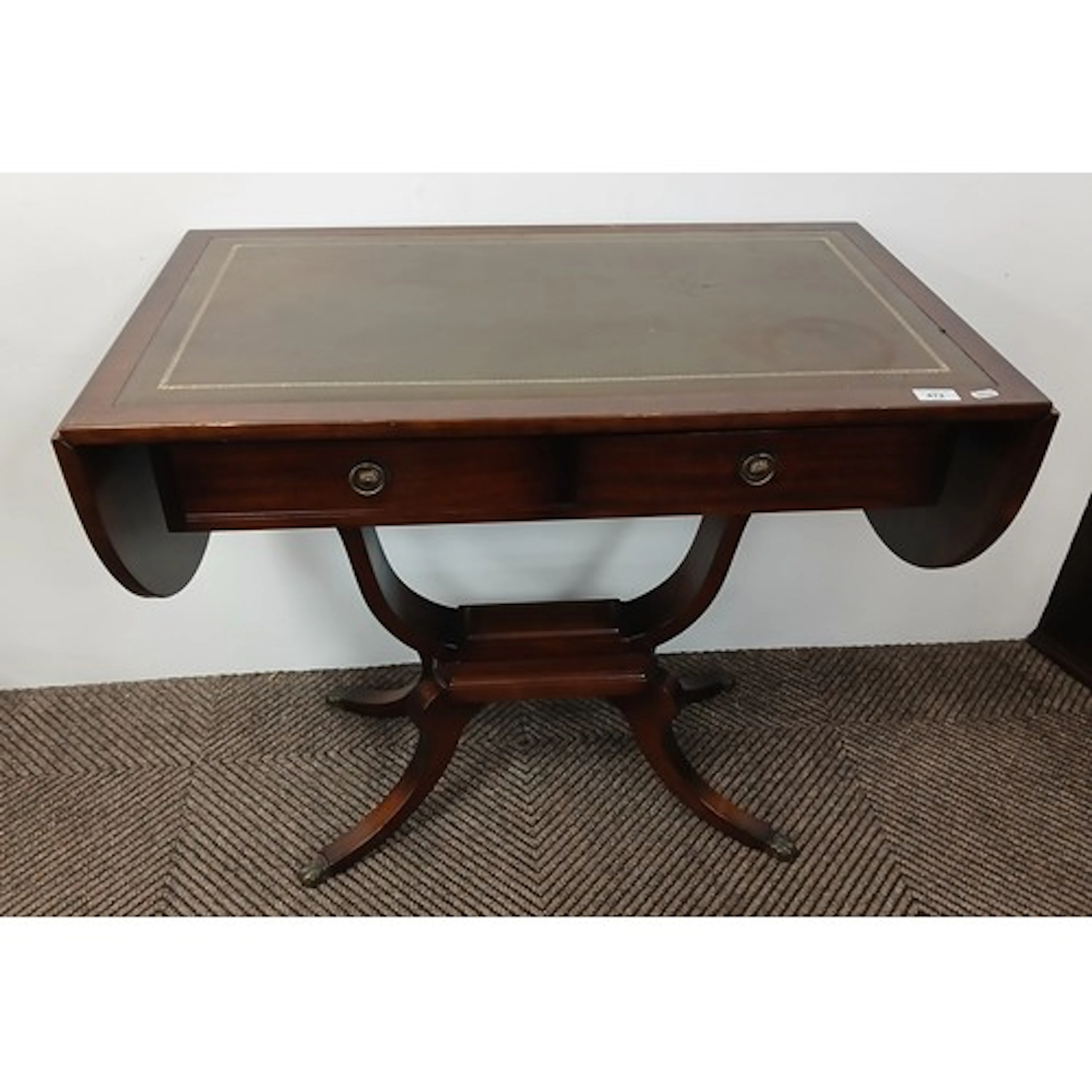 Reproduction mahogany sofa table fitted two drawers.