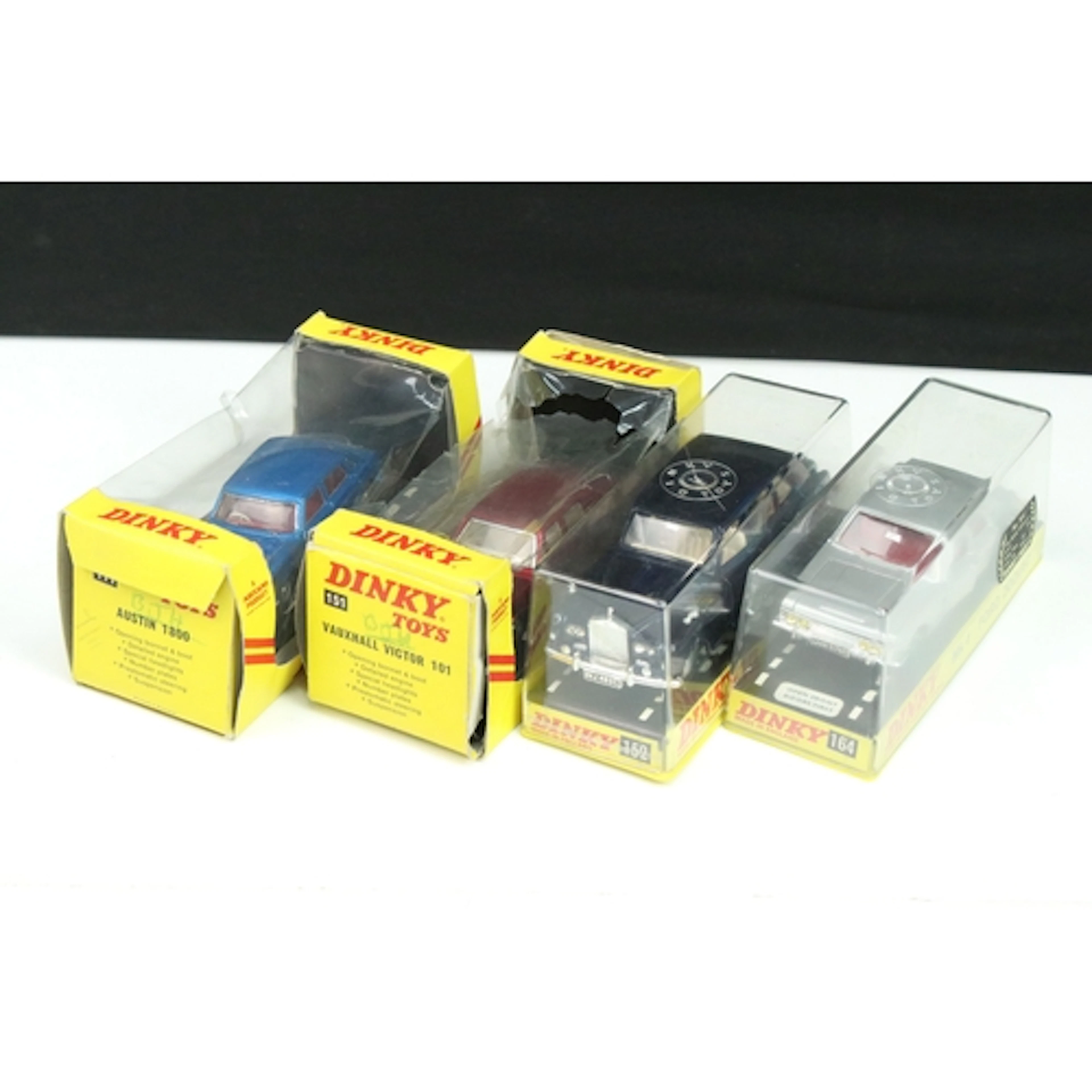 Four cased Dinky diecast models to include 164 Mk 4 Ford Zod...