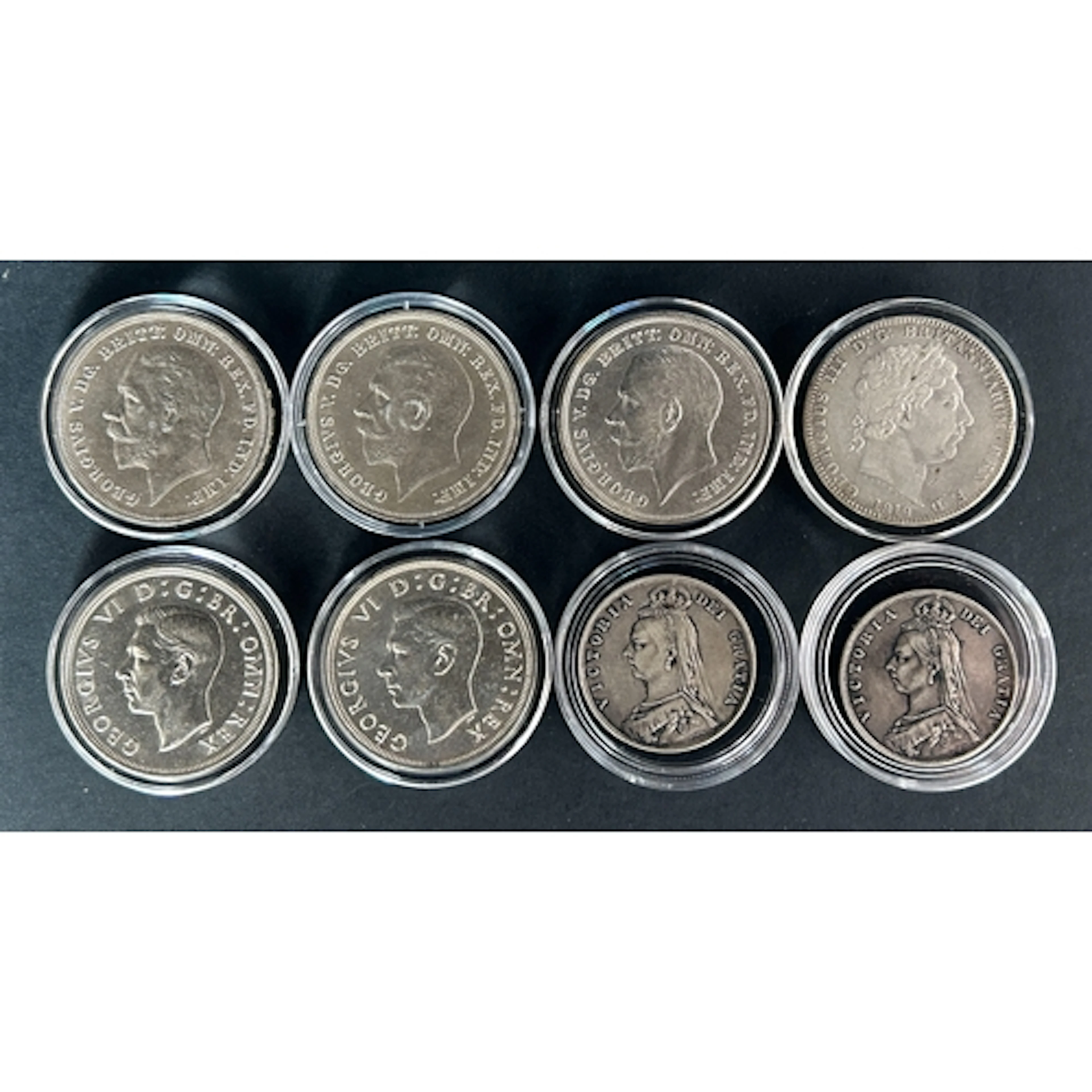 A group of eight British silver coins, comprising 1819 silve...