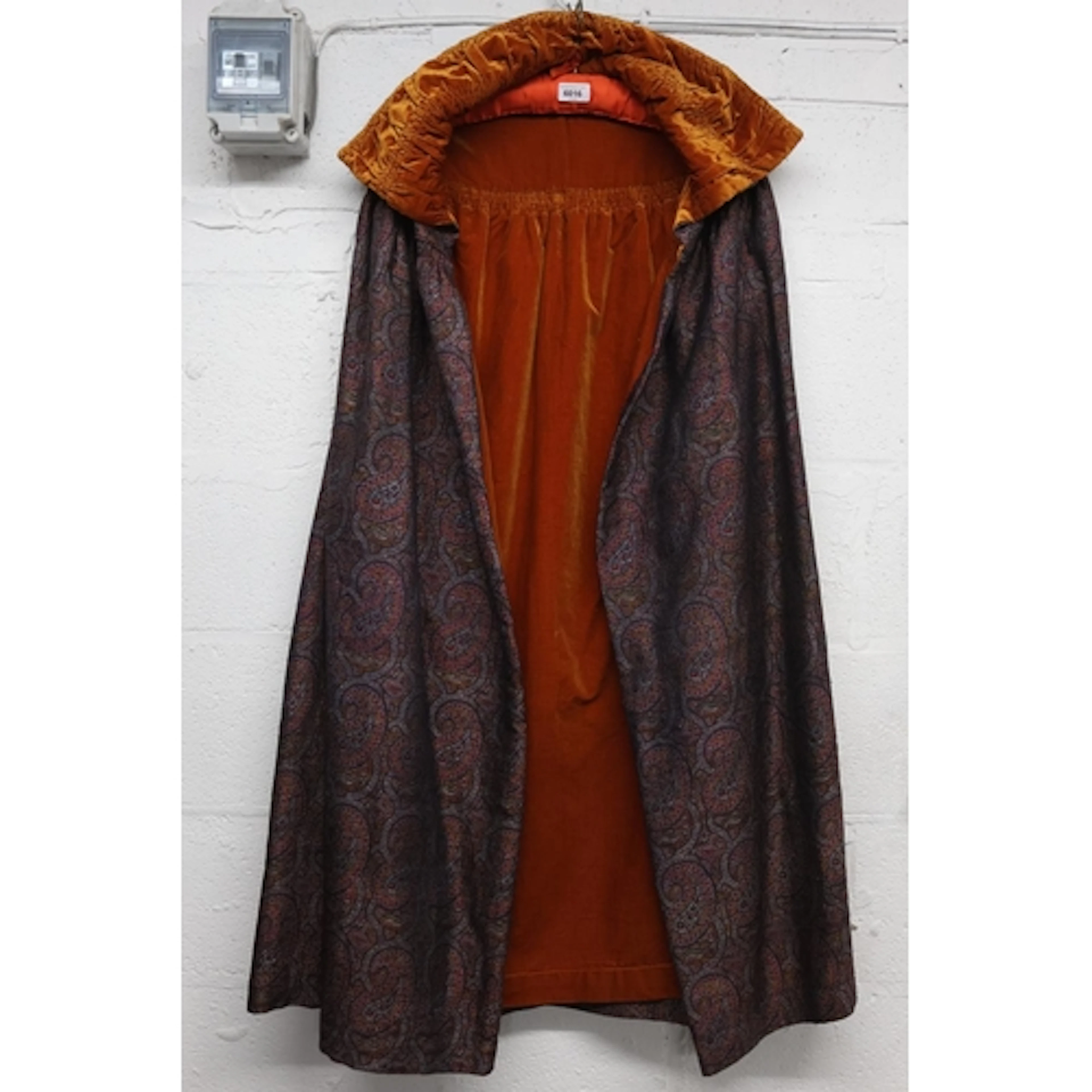 Paisley patterned cloak.