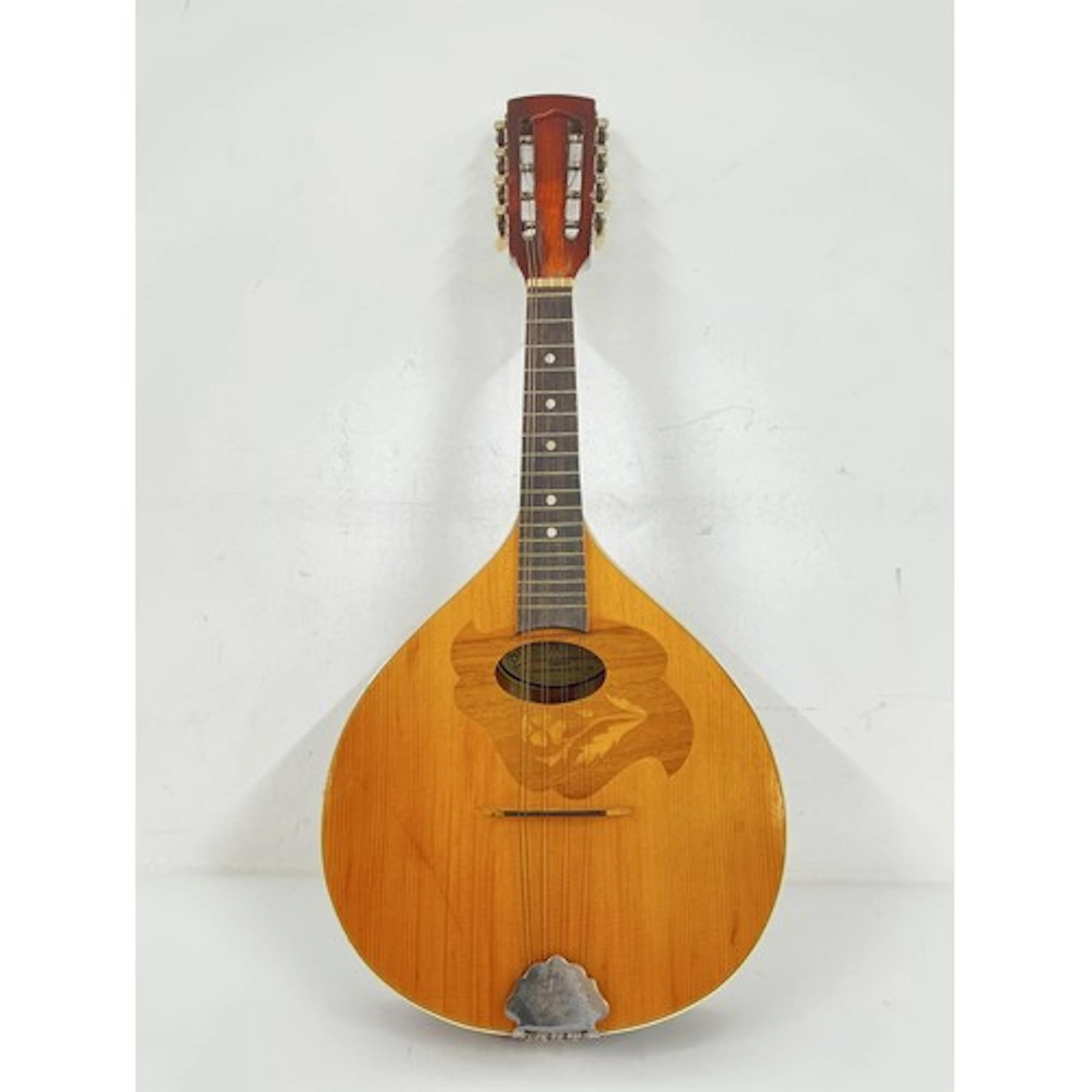 An Ozark mandolin, no case.