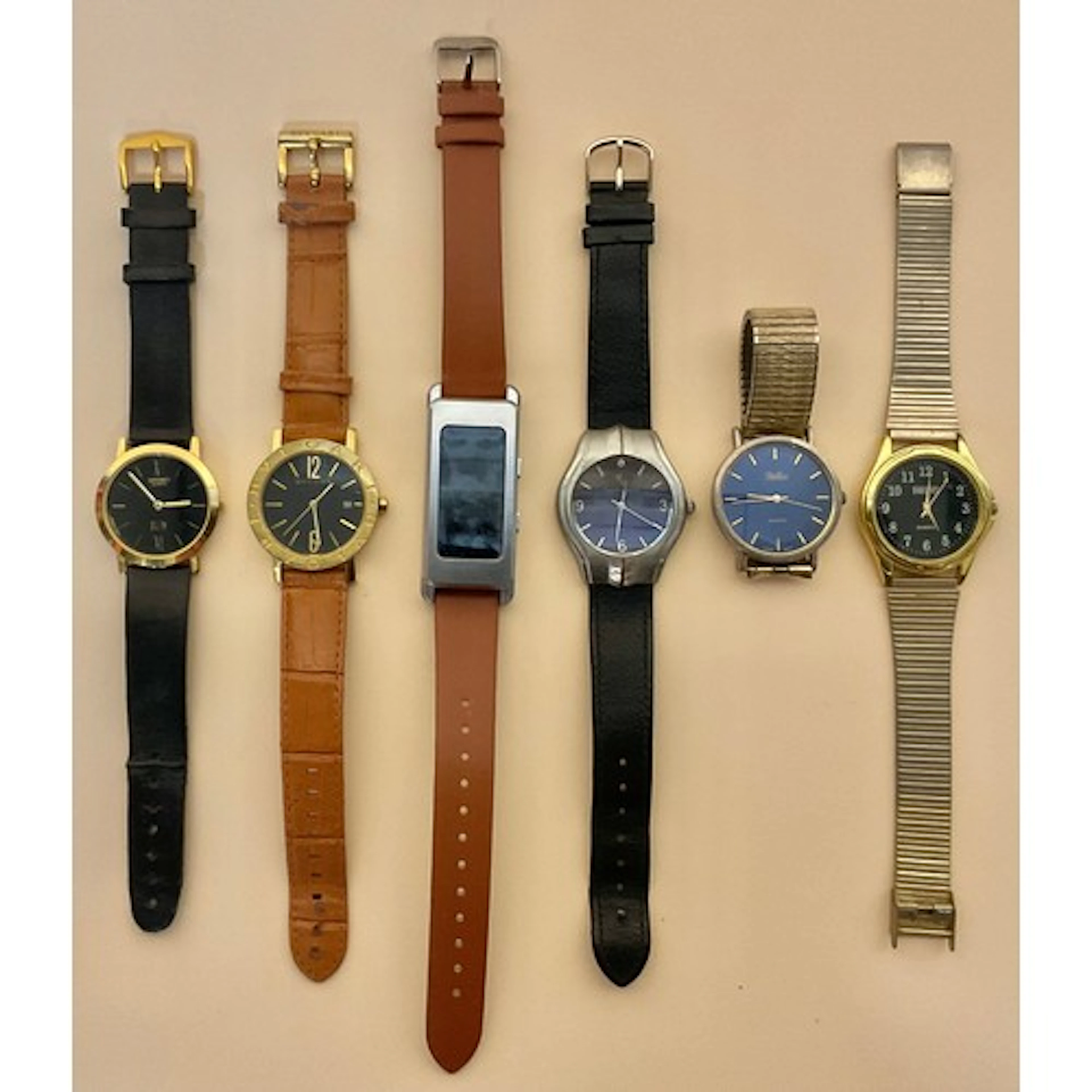 Watches - An accumulated collection of black faced dial wris...