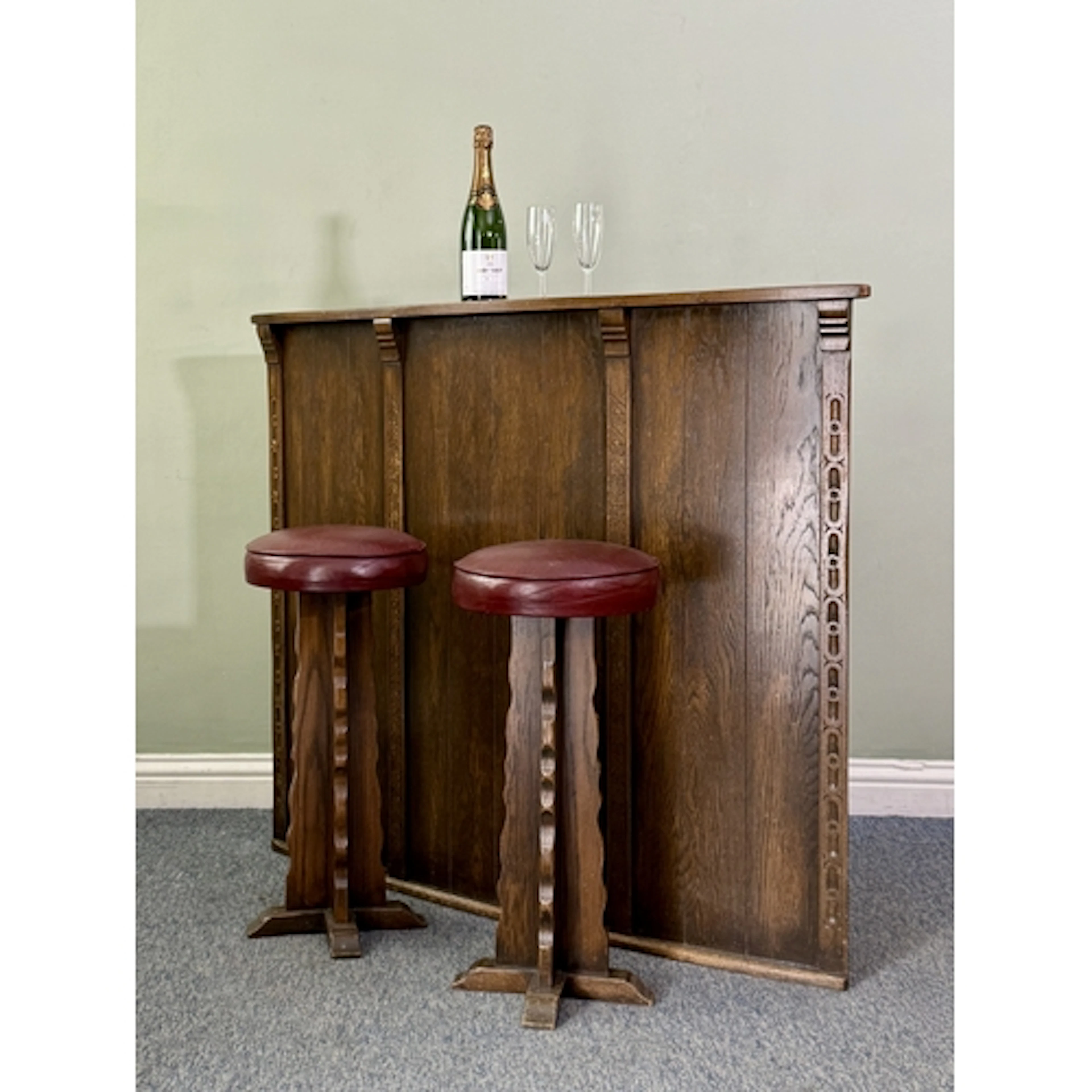 A vintage reproduction oak bar and bar stools - second half ...