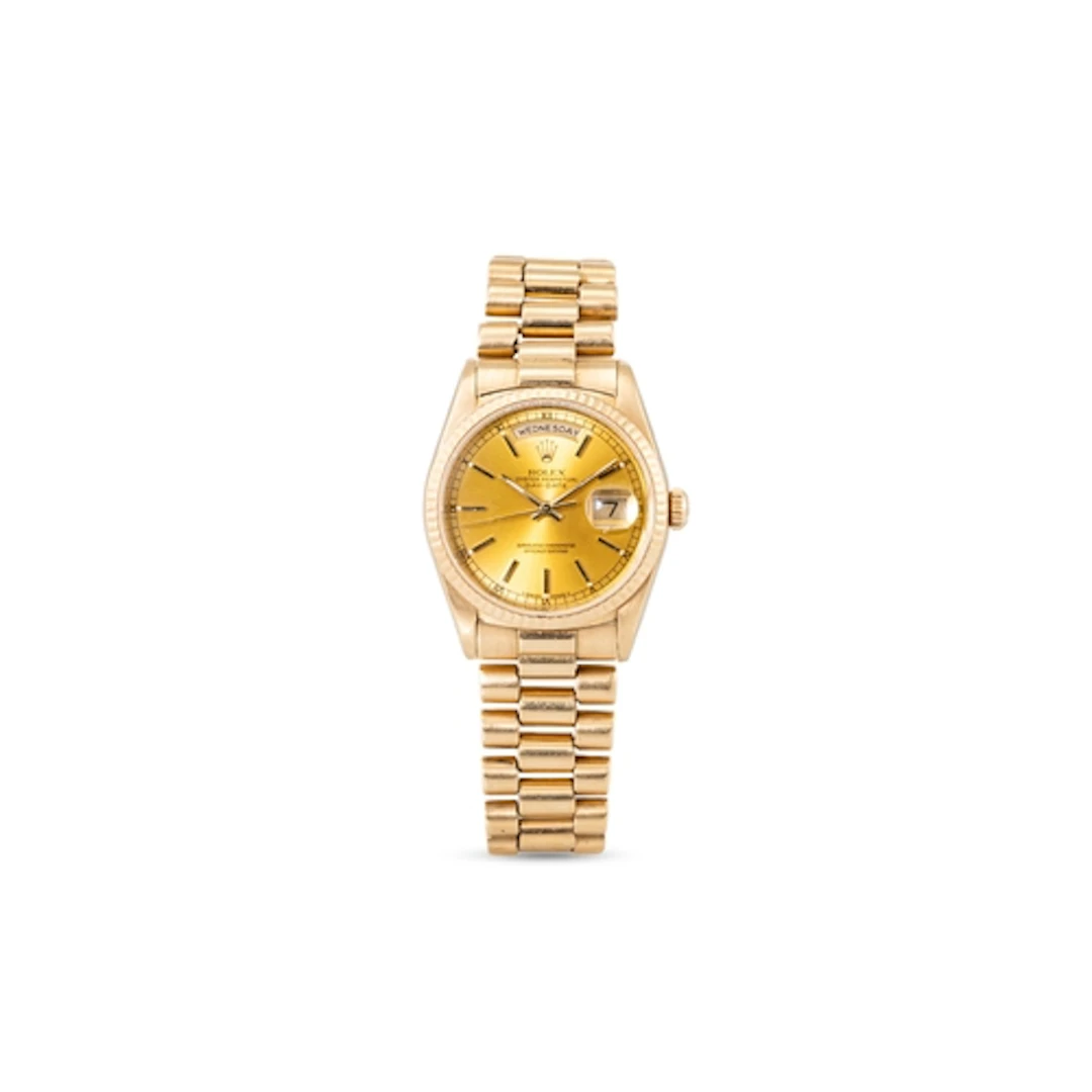 AN 18CT GOLD ROLEX OYSTER PERPETUAL DAY/DATE WRIST WATCH, wi...
