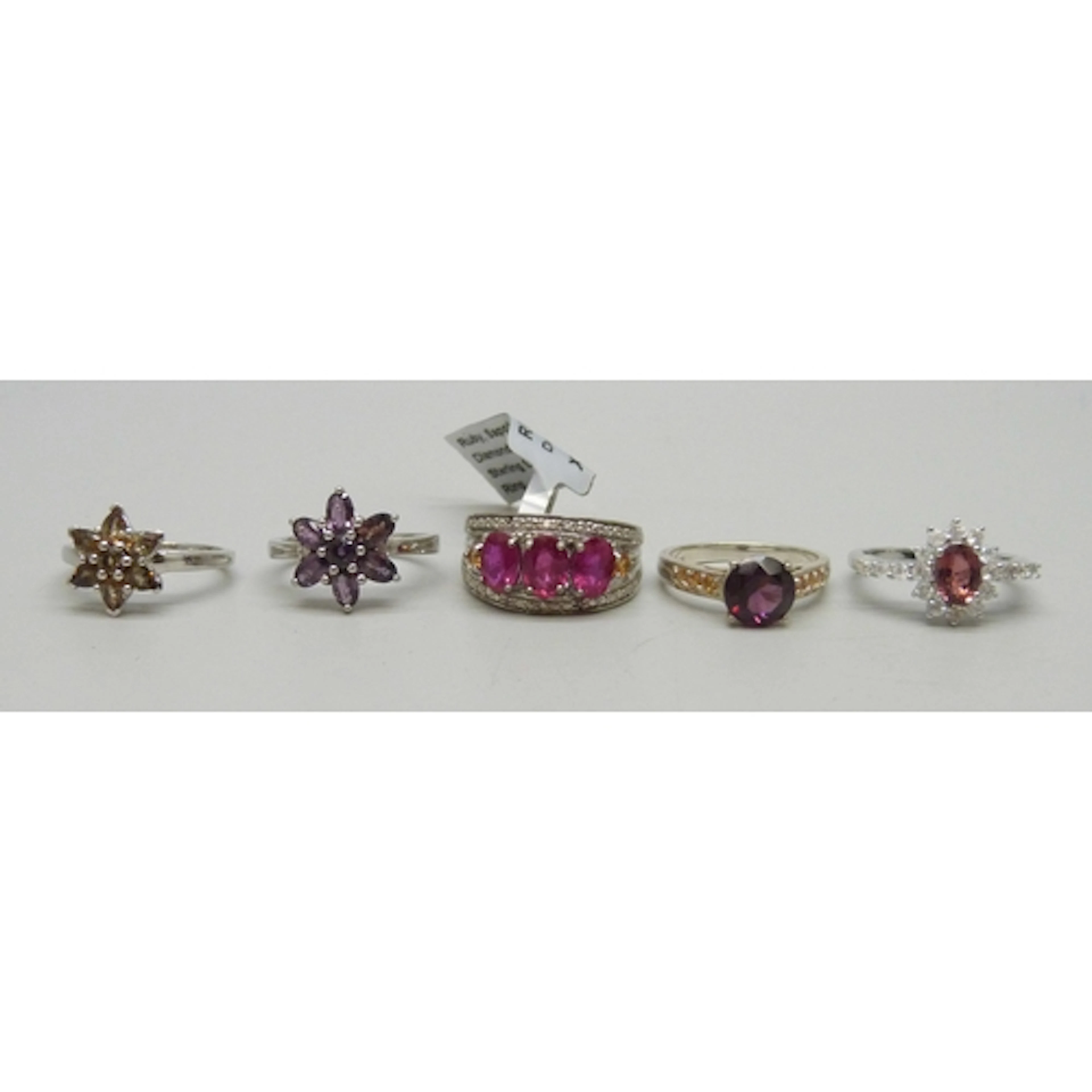 A collection of five silver TGGC, Gemporia and other gemston...