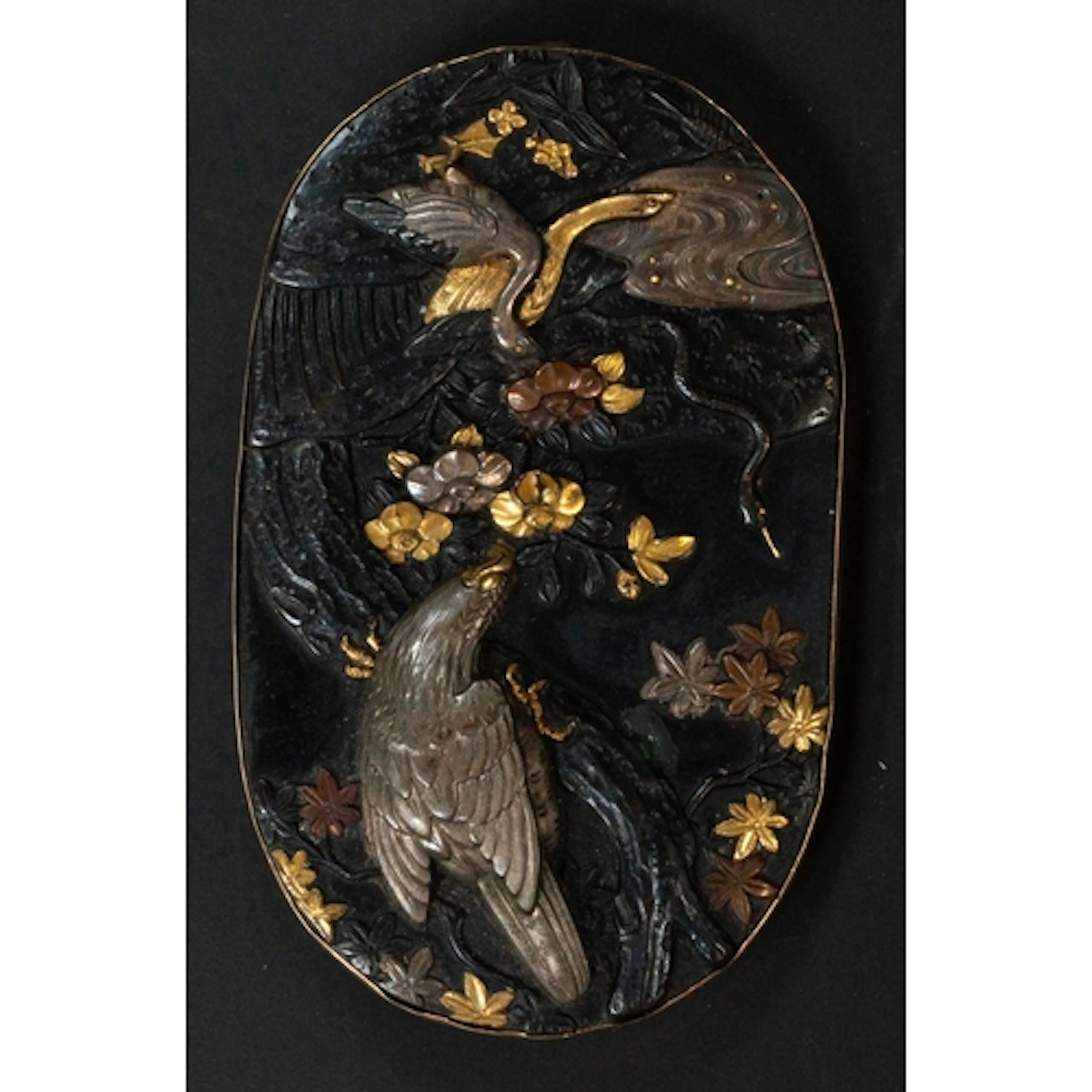 Jewellery: a Japanese mixed metal part buckle, depicting a b...