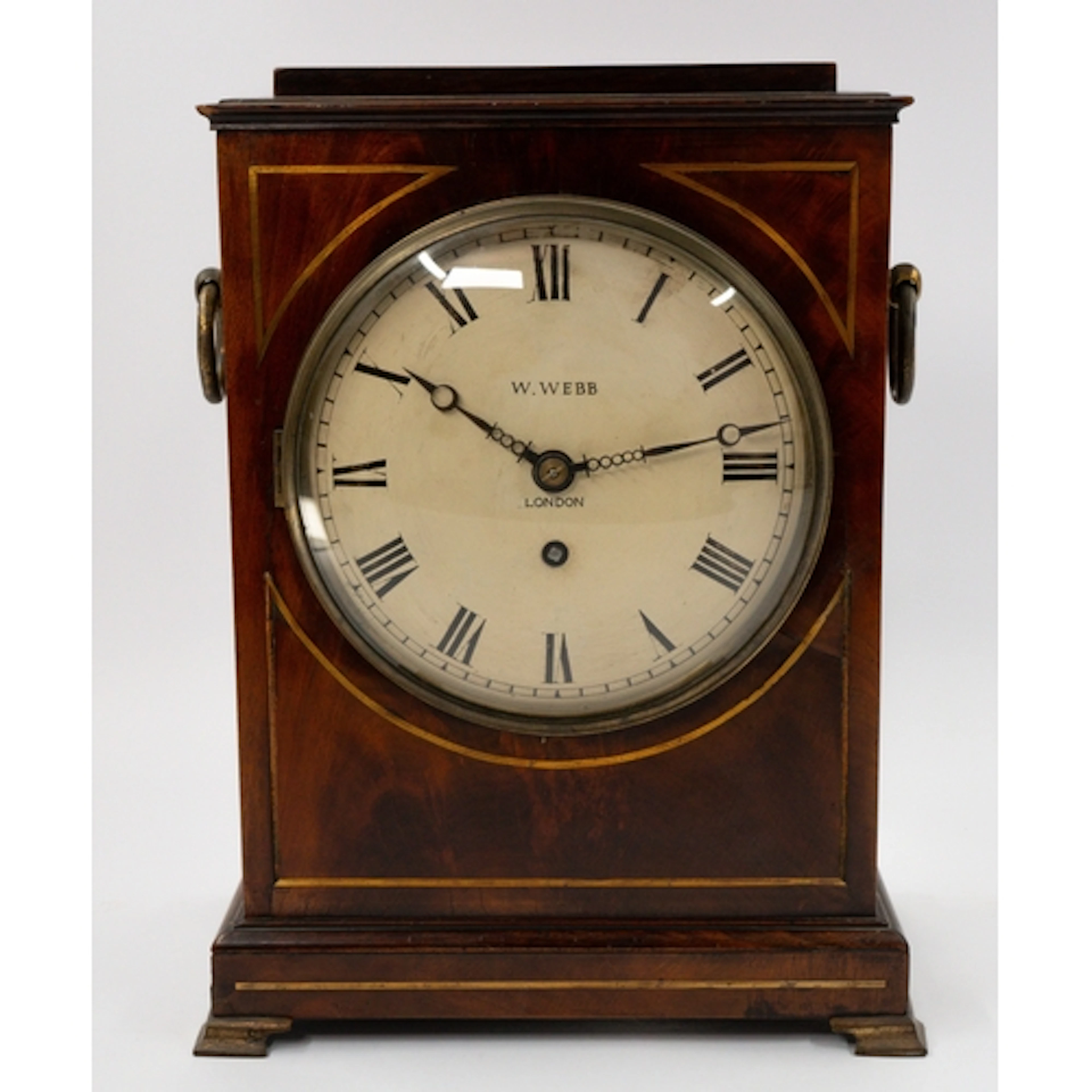 Clocks: an early 19th century mahogany cased fusee mantel cl...