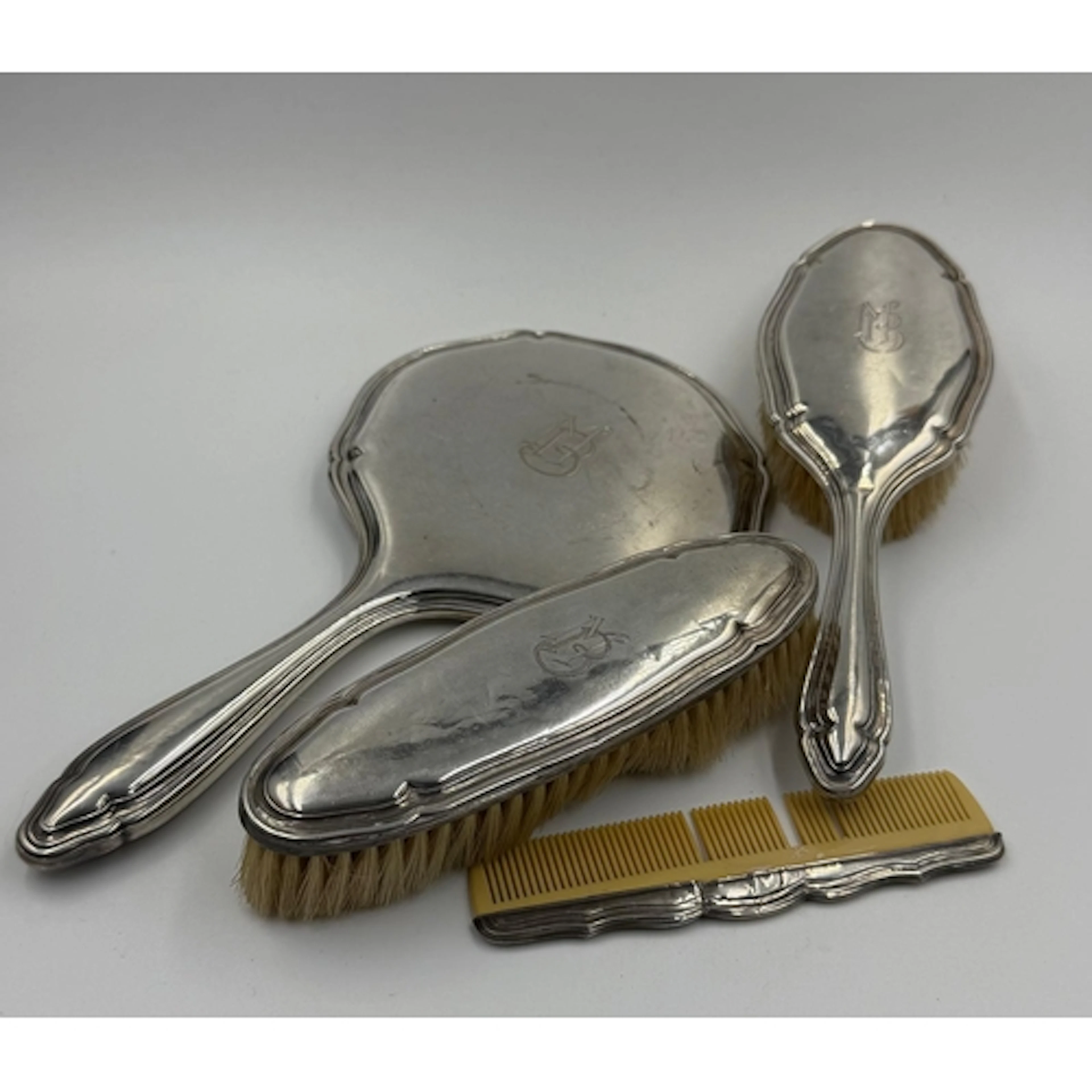 A Continental silver, marked 835S, backed dessing table set ...