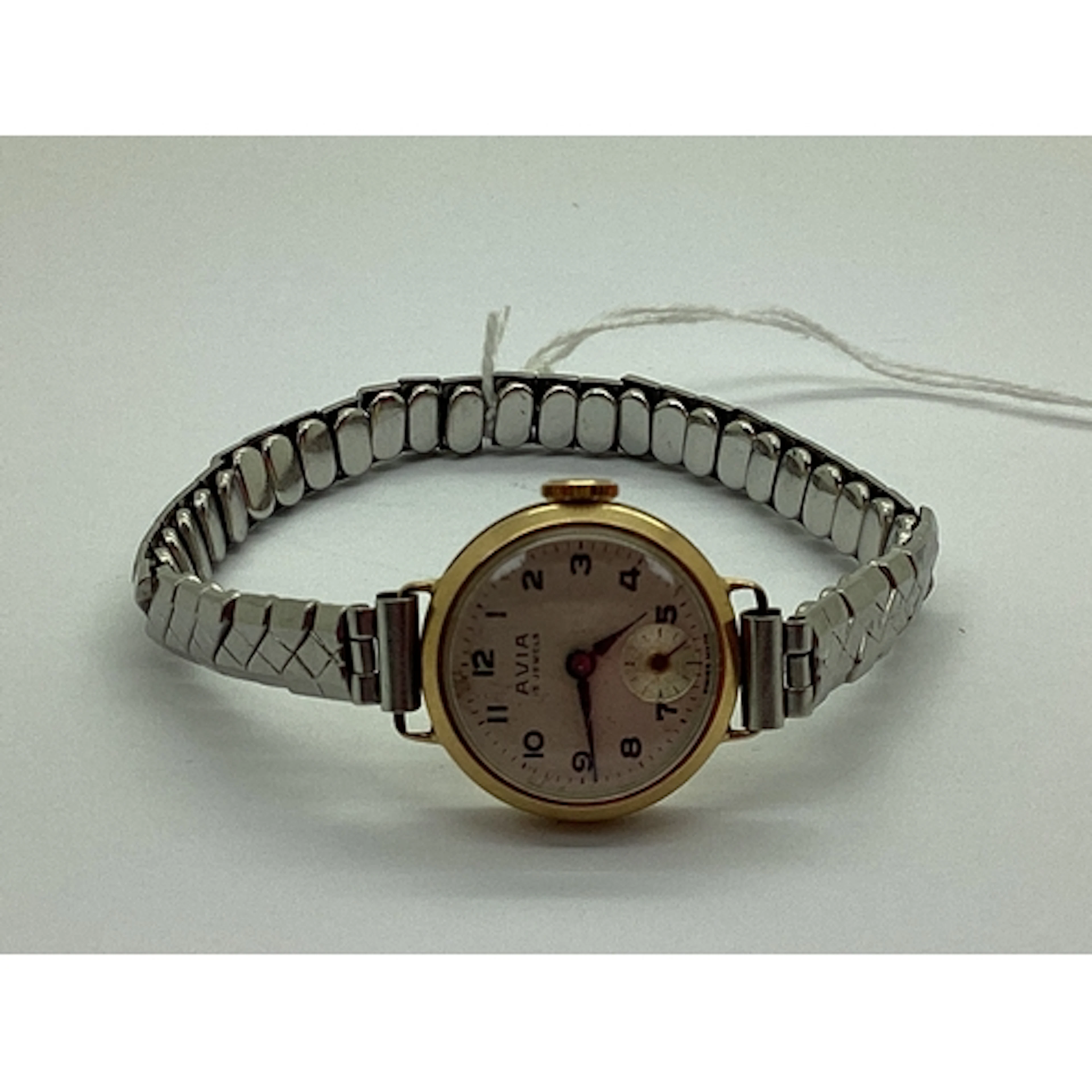 Avia; A 9ct Gold Cased Ladies Wristwatch, on later expanding...
