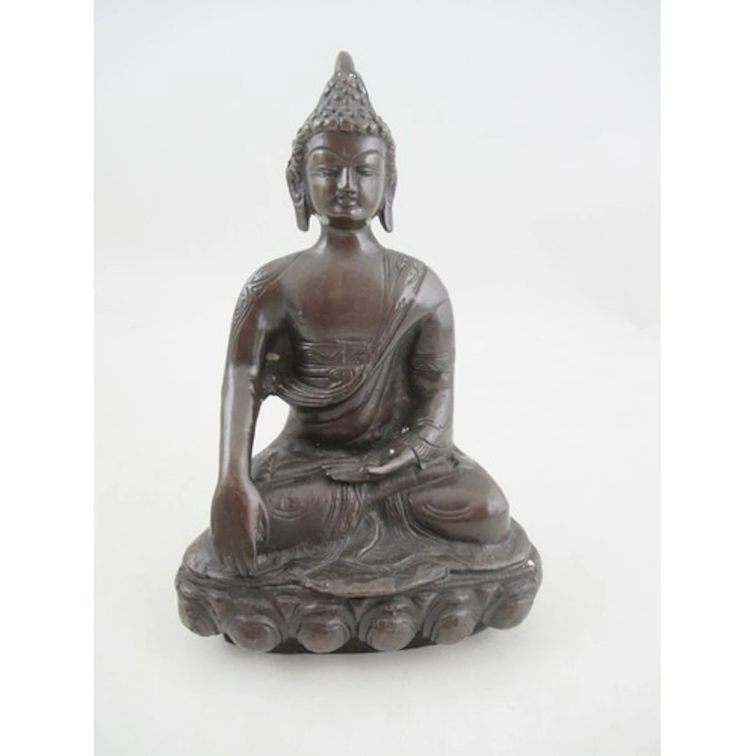 An oriental or eastern bronzed model, of a Buddhist Statute,...