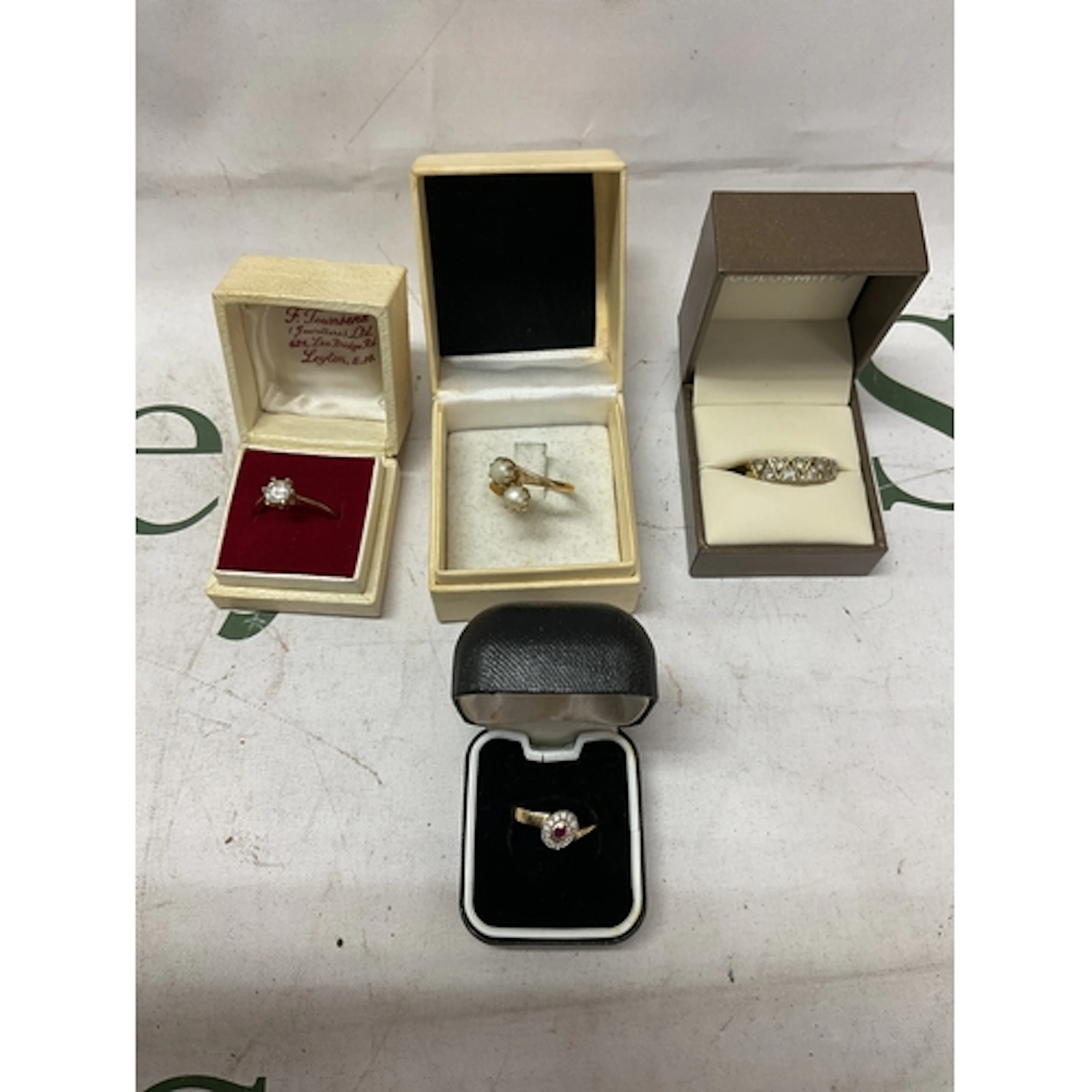 14ct diamond and ruby ring along with three dress rings to i...