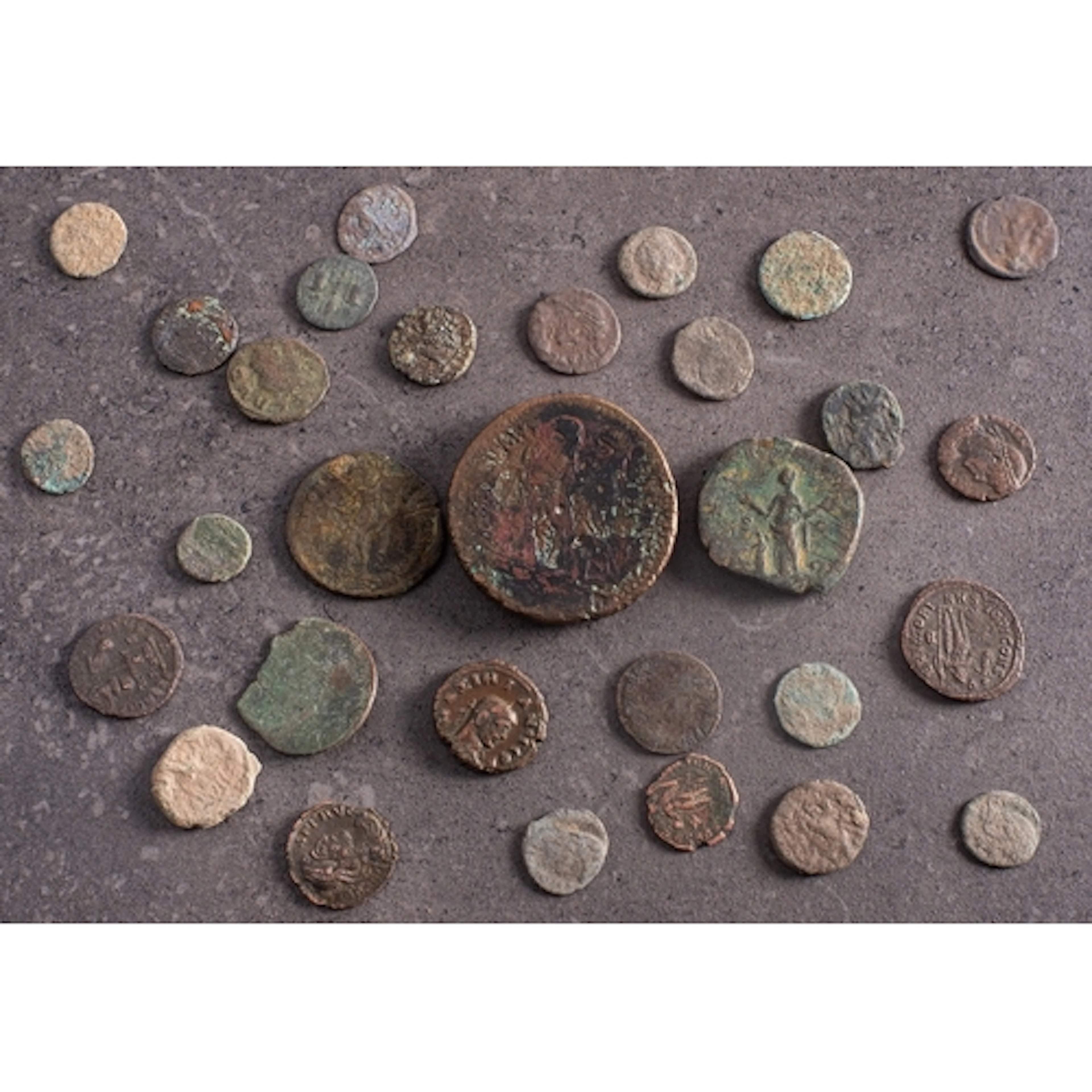 A collection of ancient coins. Including Bay of Roman coins ...
