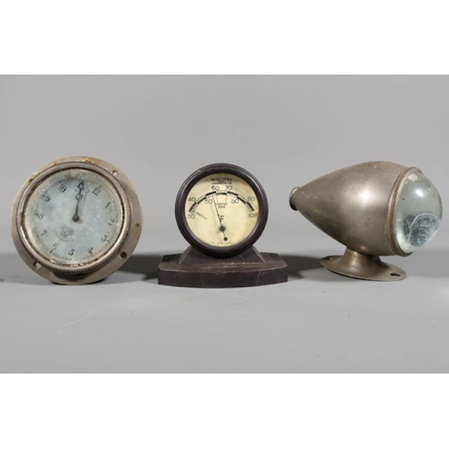 Smiths car clock, a Brolt bullet side lamp, and a Bakelite R...