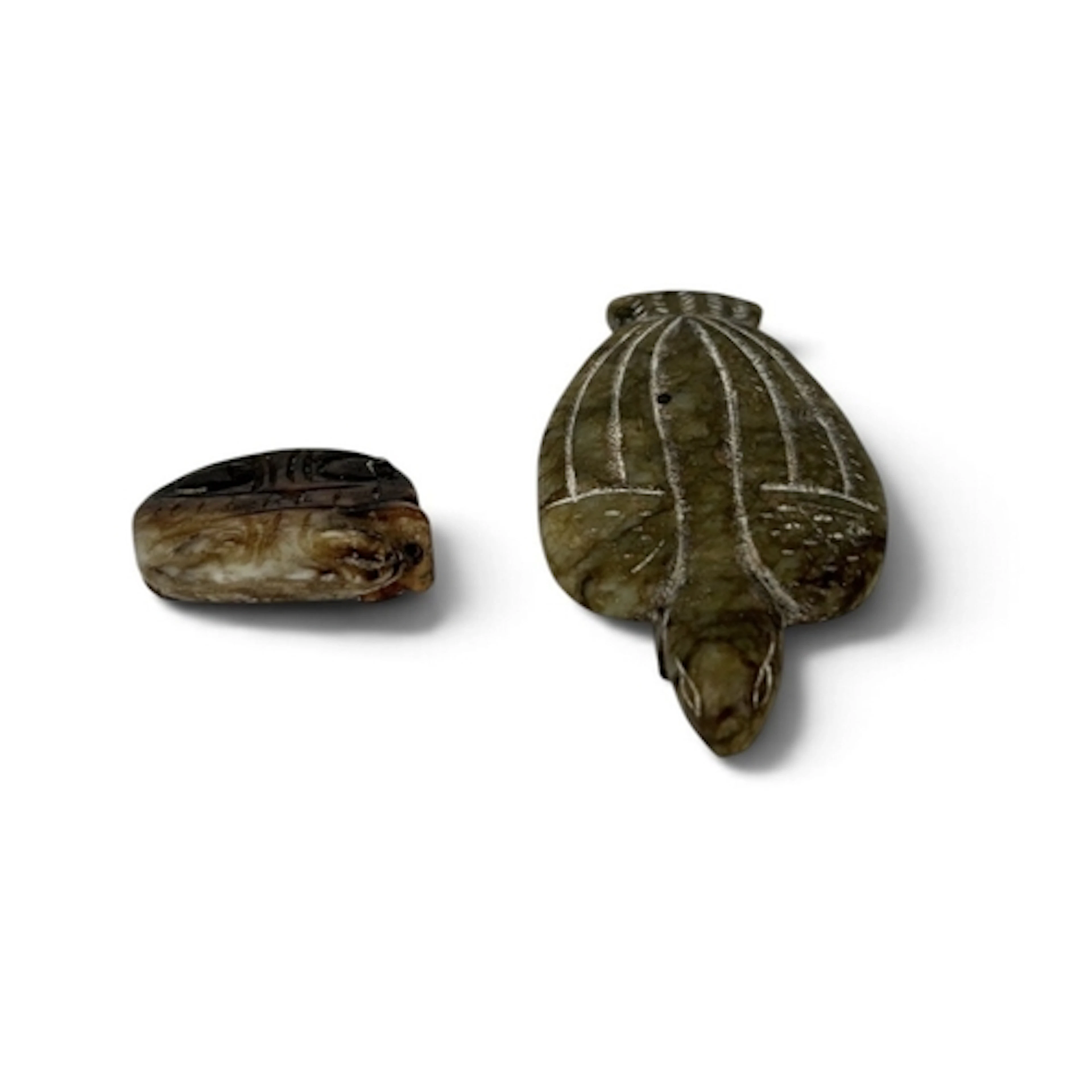 TWO CHINESE ARCHAIC JADES One in the form of a turtle. Large...