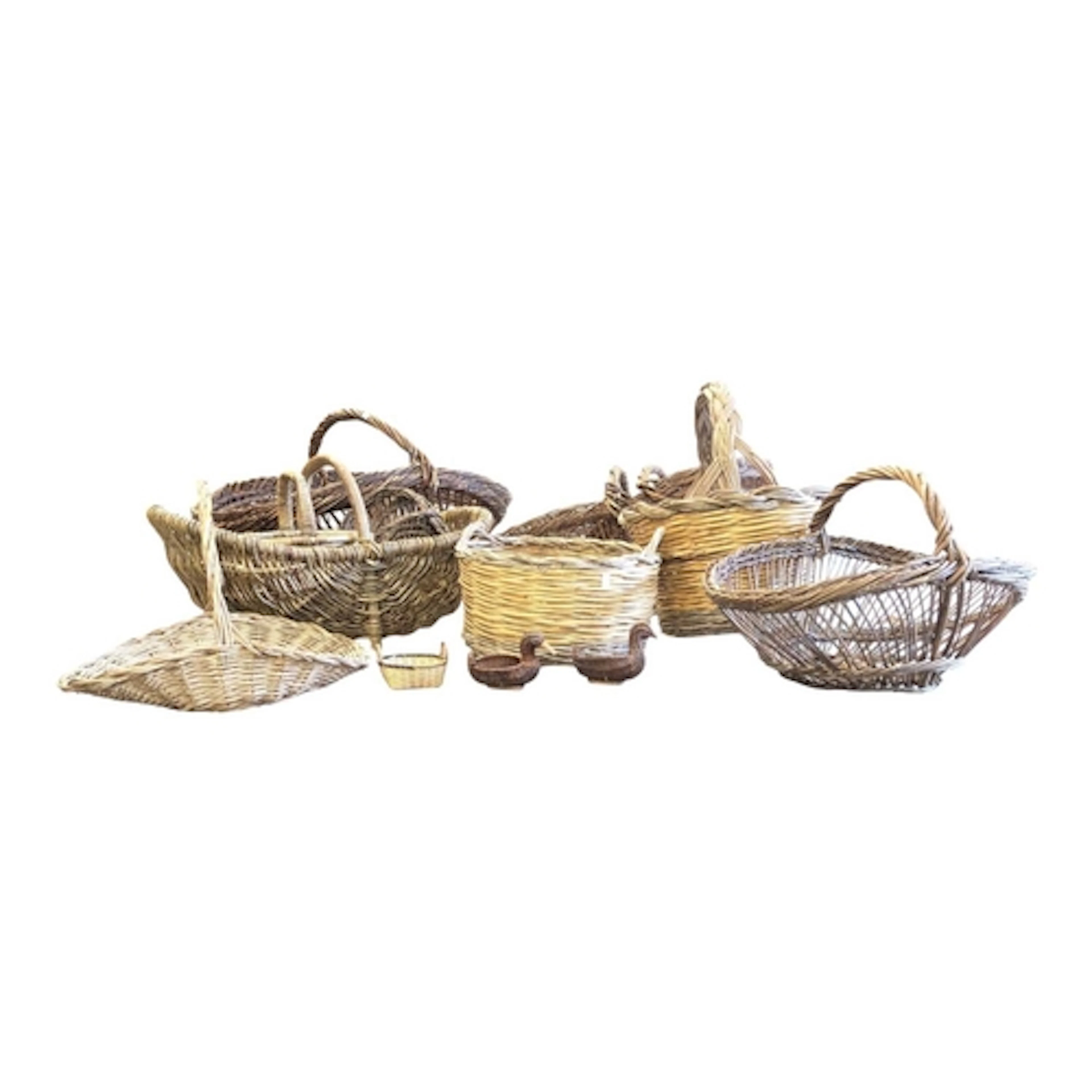 A colection of 20th century provincial wicker baskets varyin...