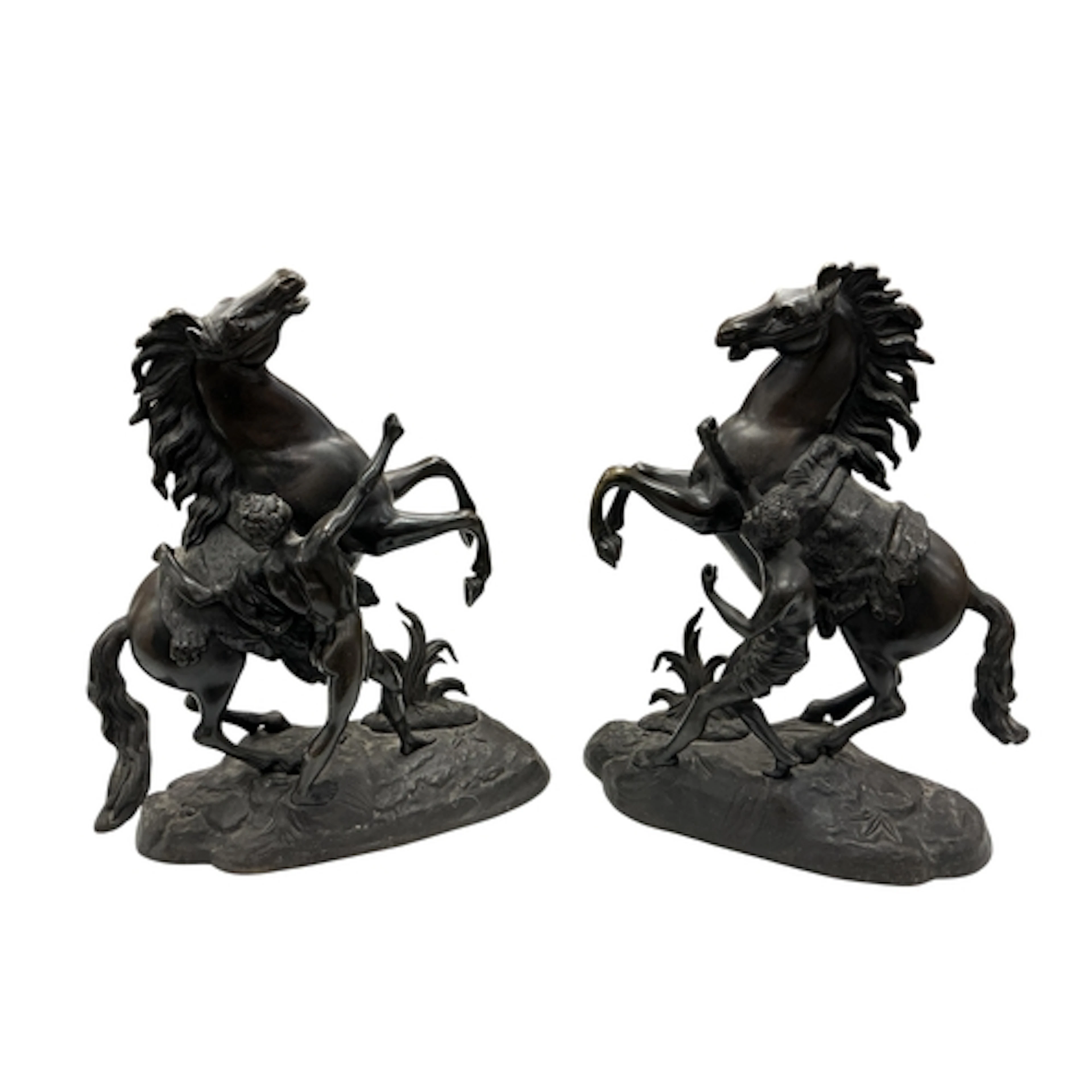 After Guillaume Coustou, a pair of bronze Marley horse group...