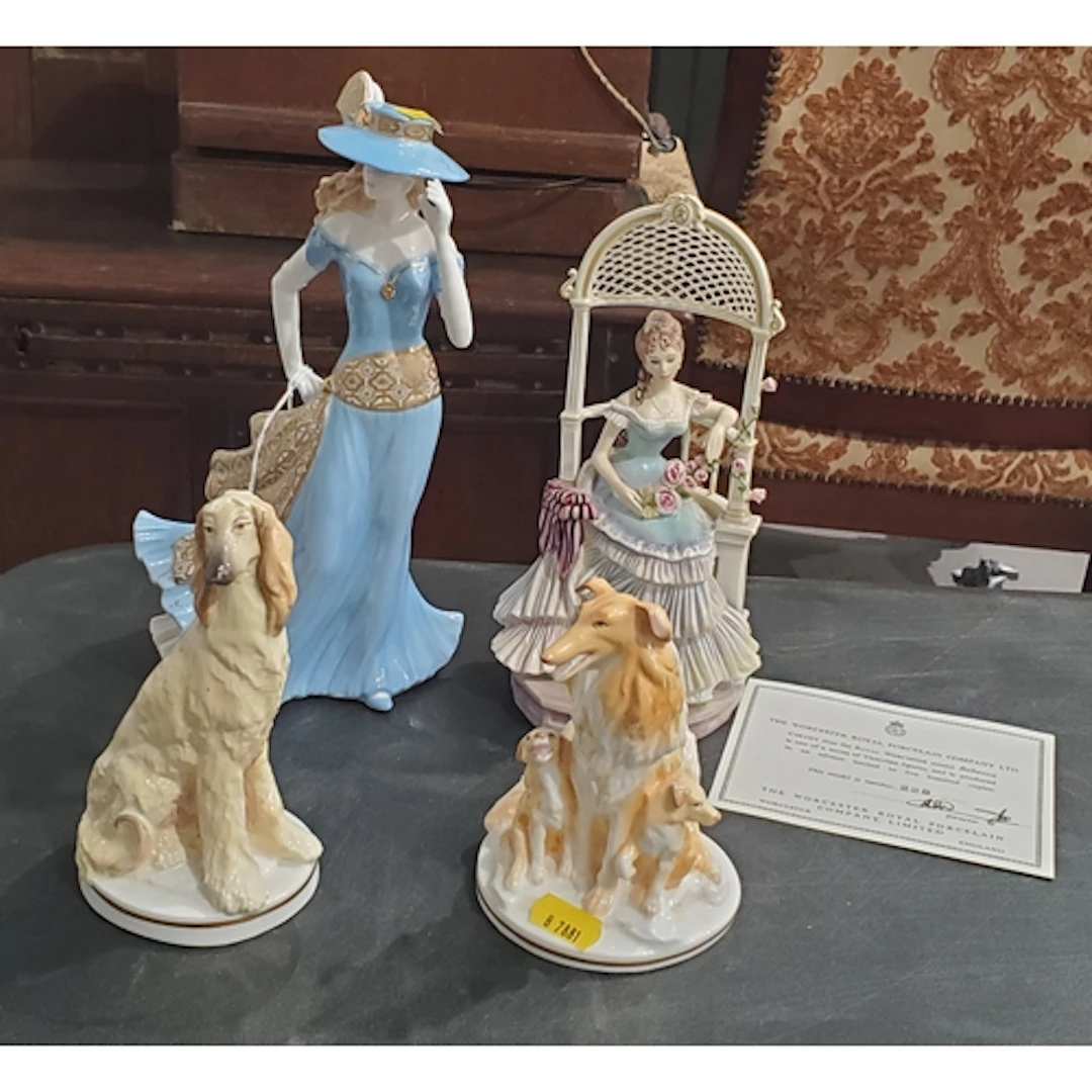 Four Royal Worcester Figures comprising Afghan Hound, Collie...
