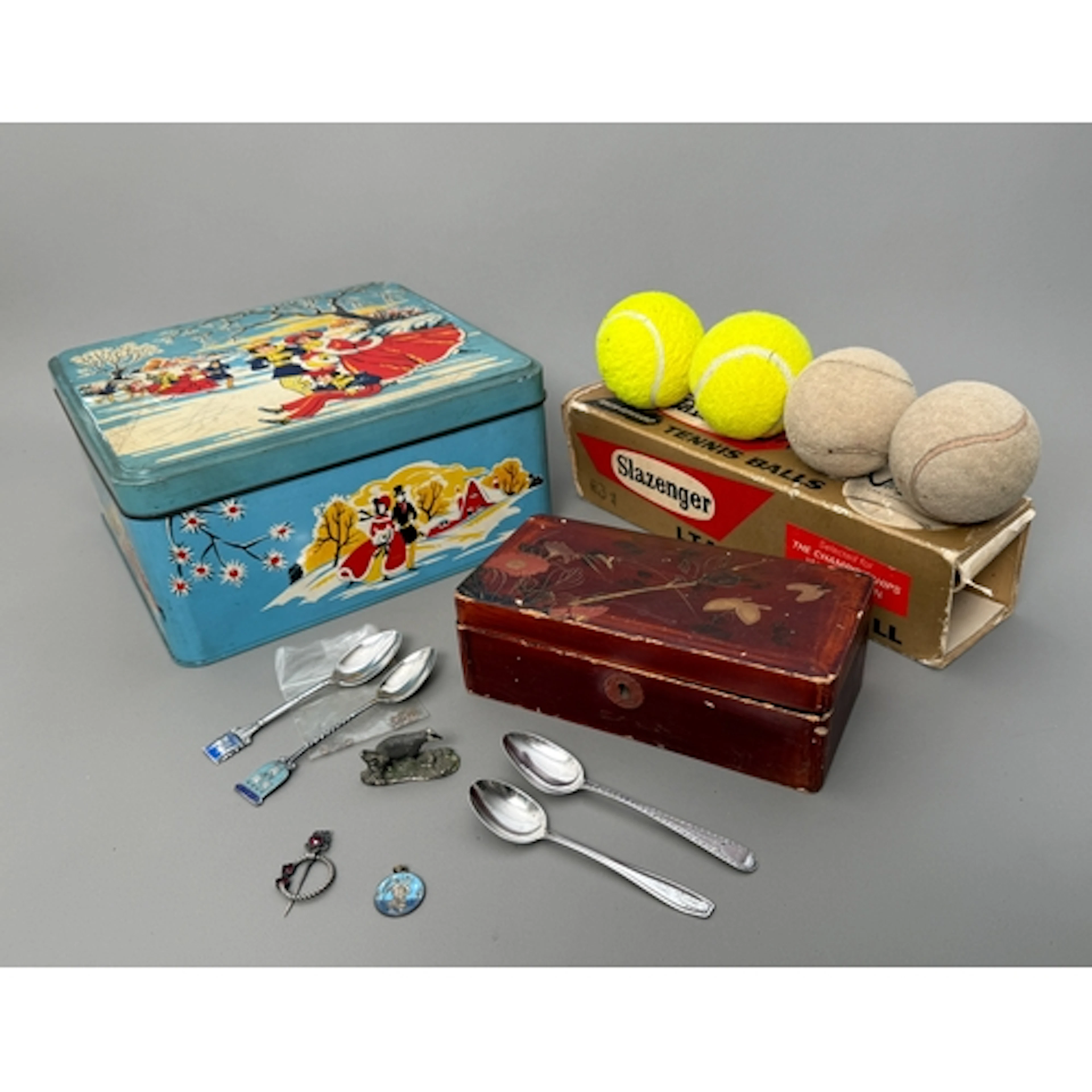 A collector's lot to include four silver teaspoons - a souve...