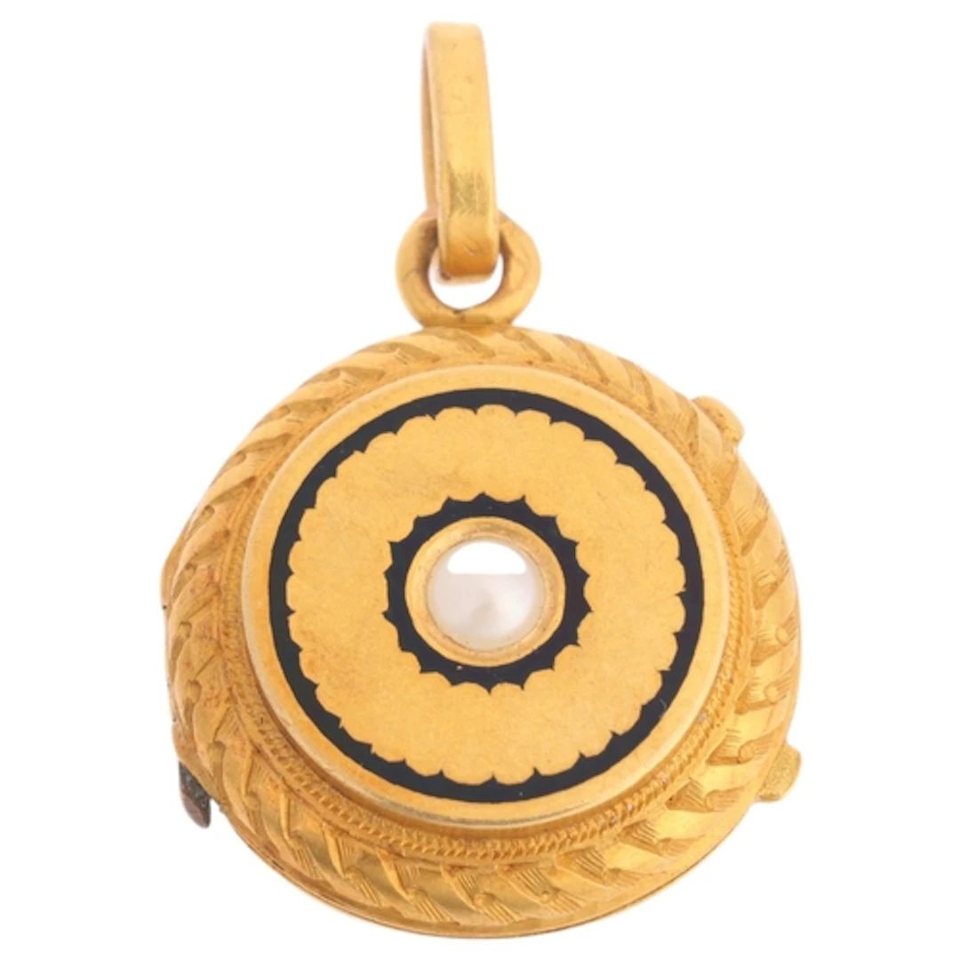An Antique French 18ct gold split pearl and black enamel loc...