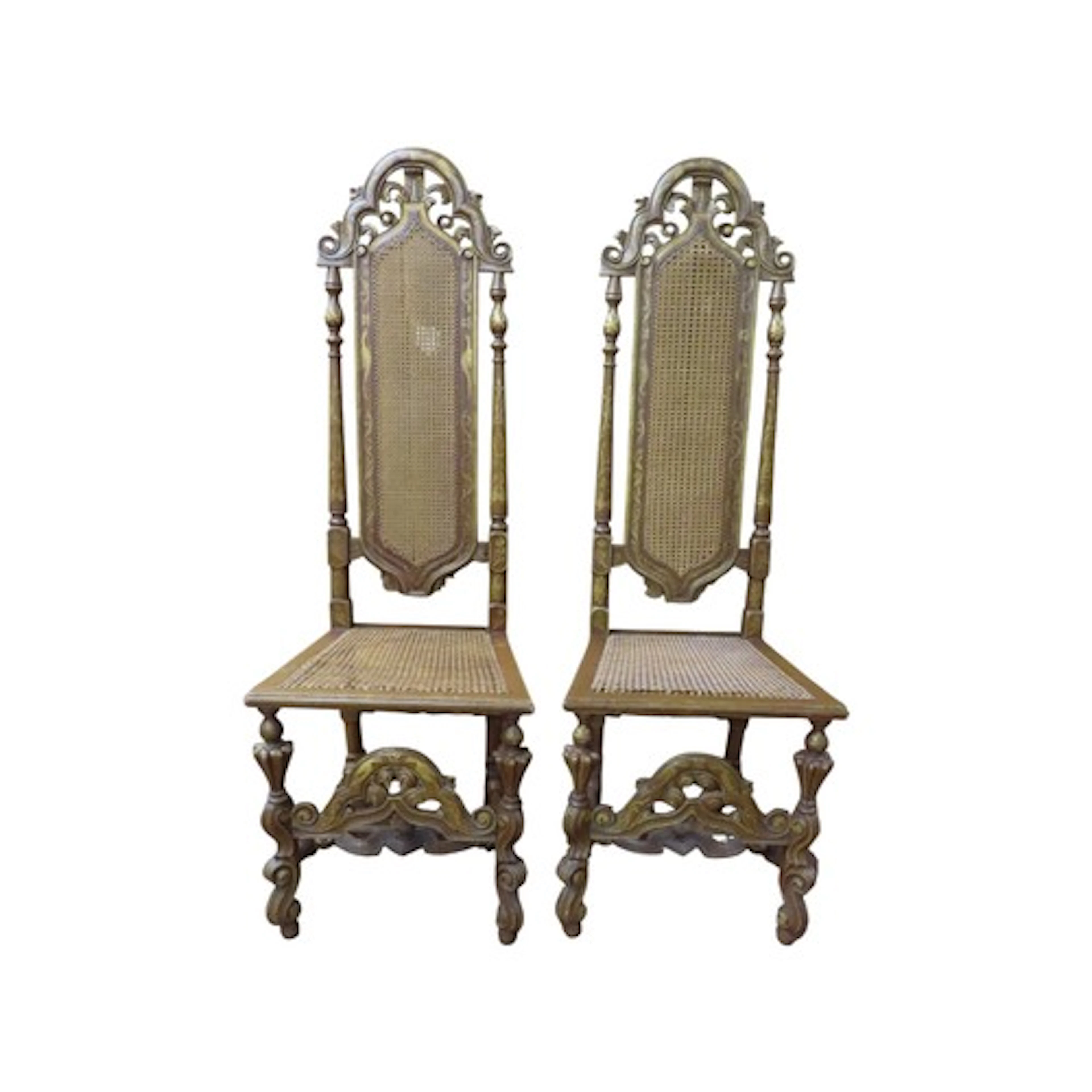 A pair Carolean style side chairs with cane panelled seats a...