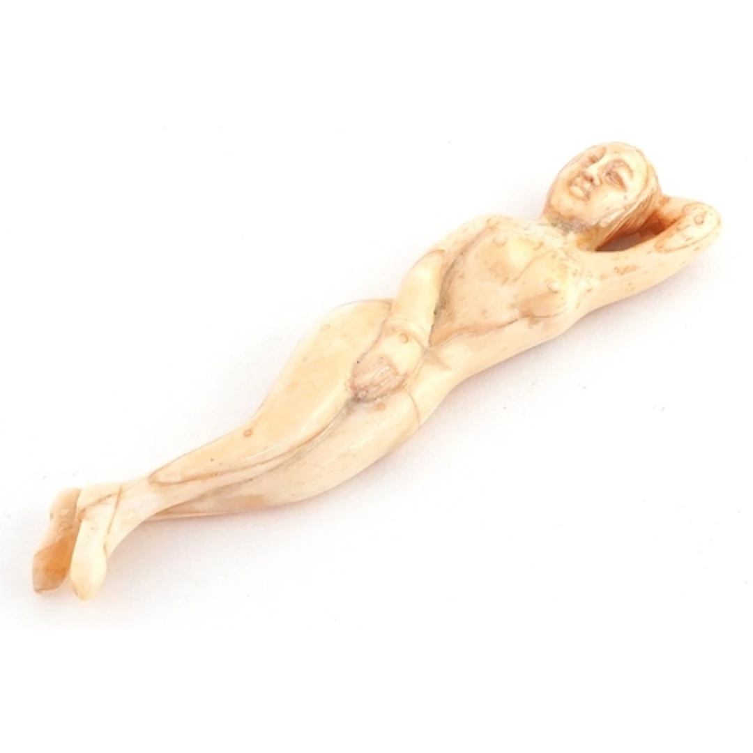 Scrimshaw style carved bone study of a nude female, 13cm in ...