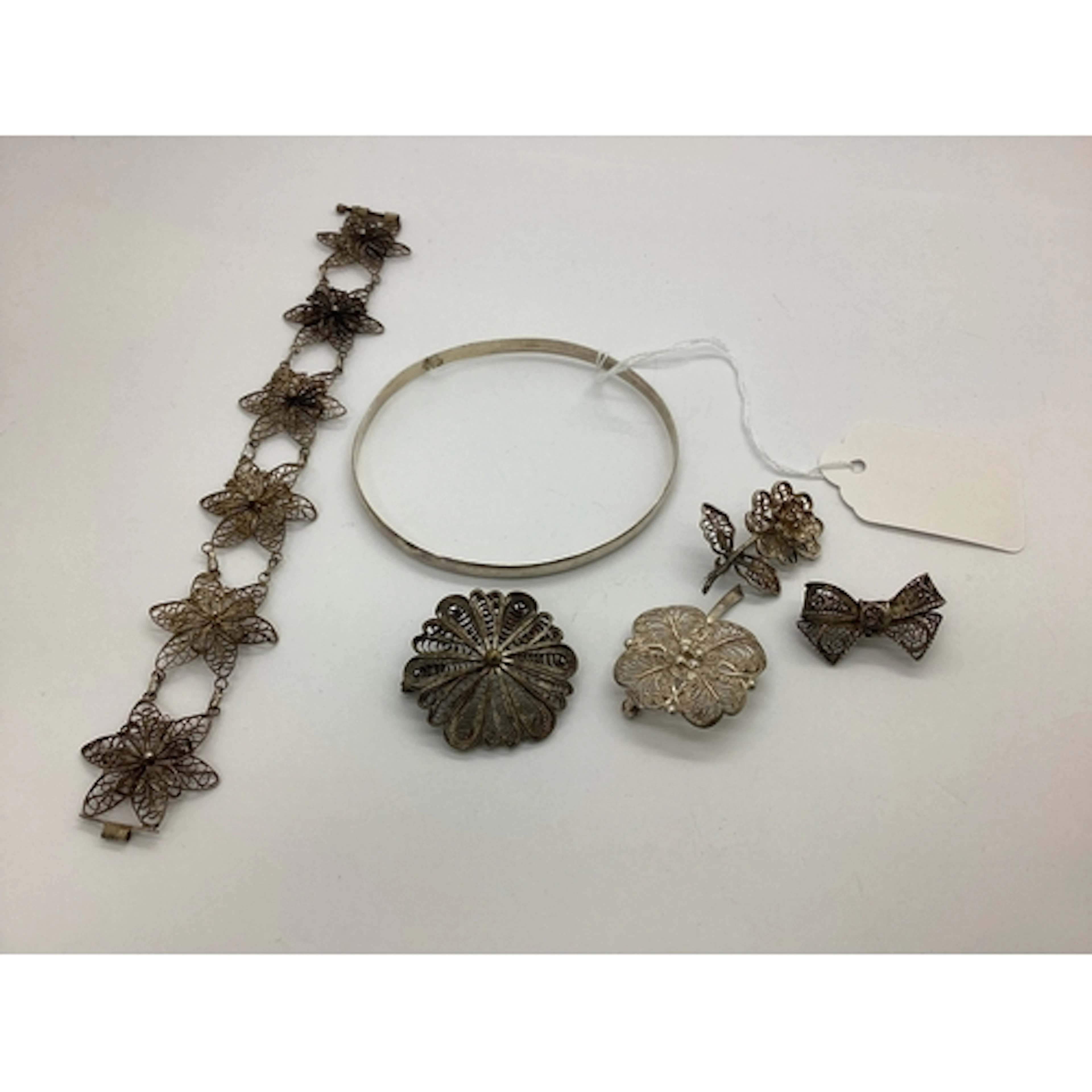 A Floral Filigree Panel Bracelet, to oval link connections, ...