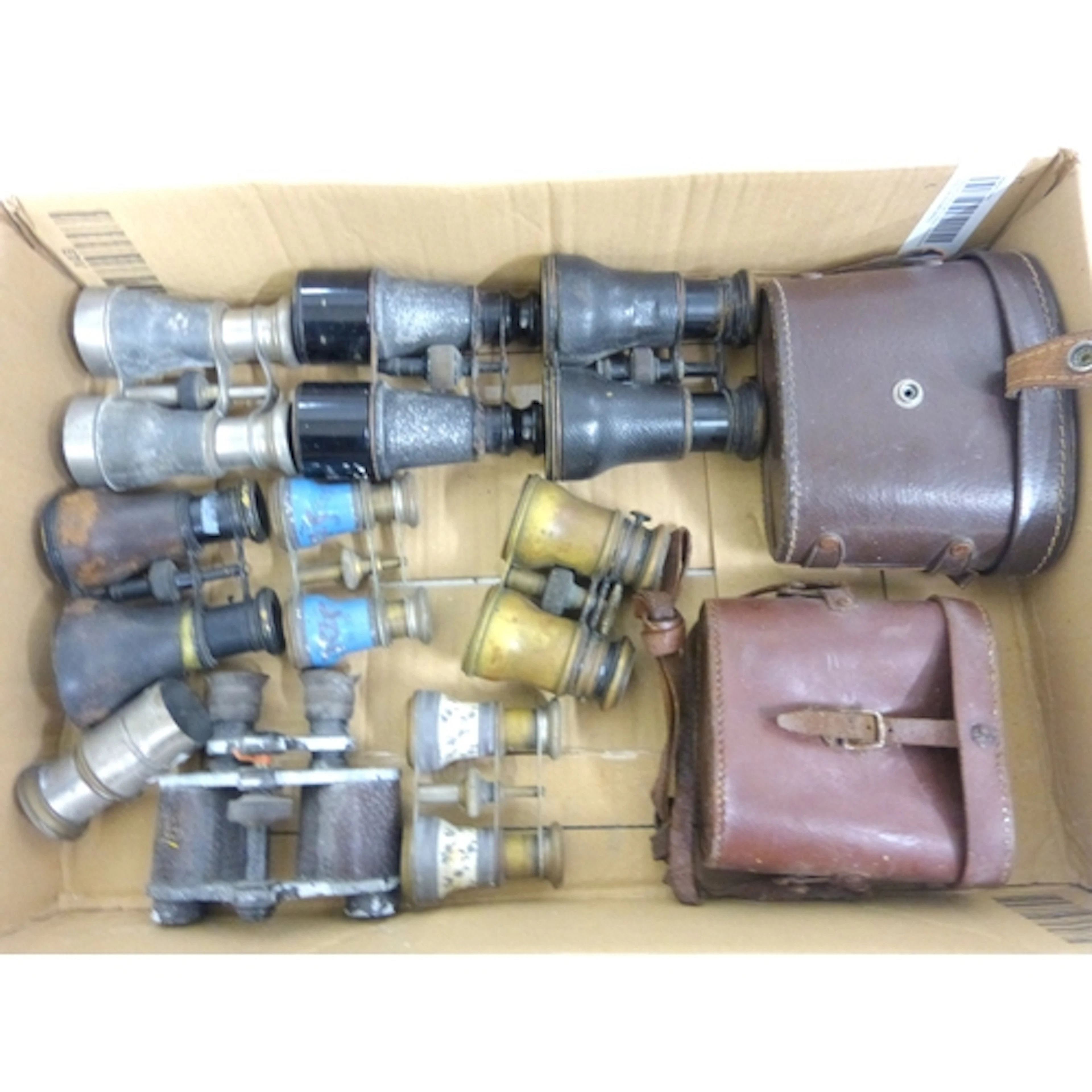 Box of vintage binoculars.