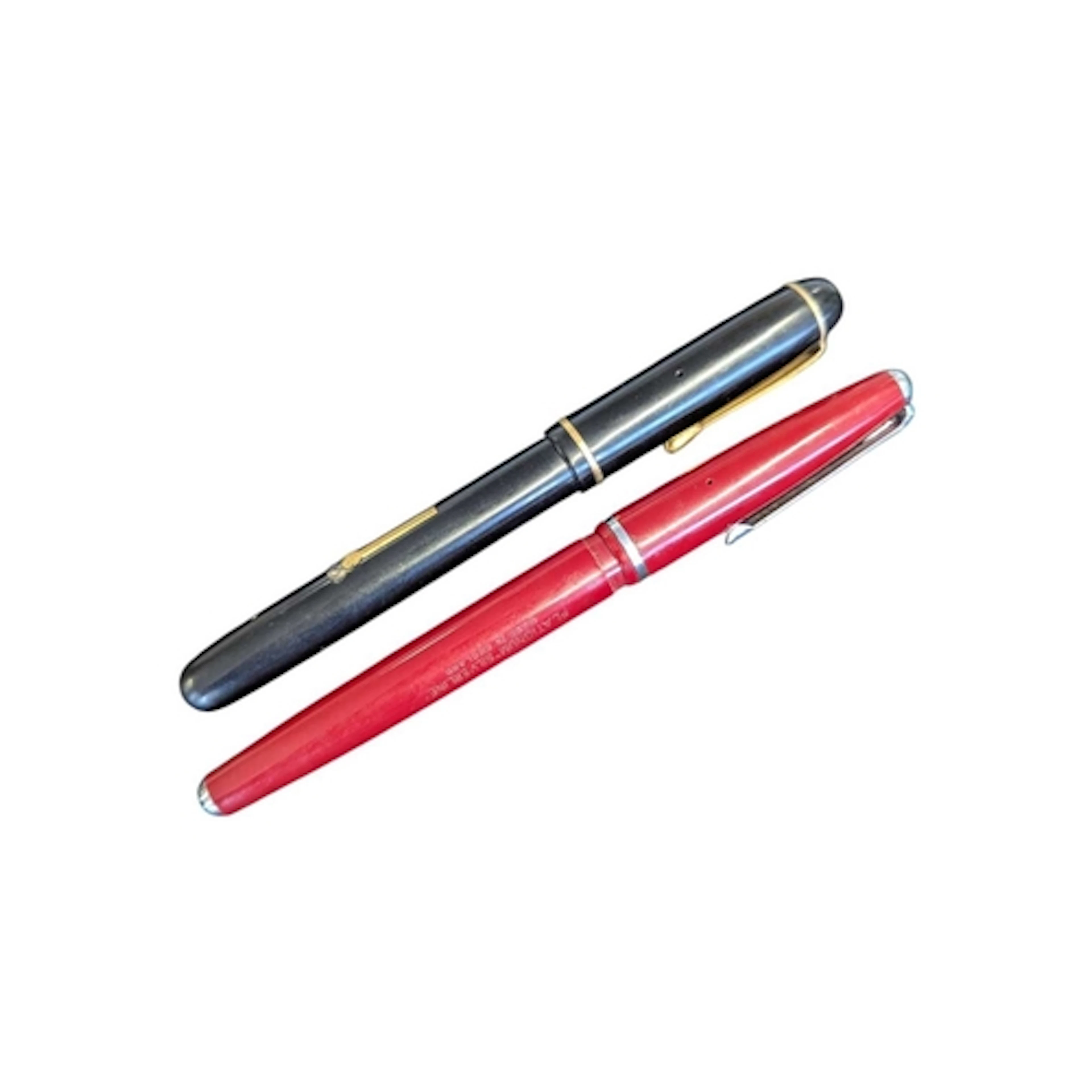 Two vintage 20th century fountain pens. The collection to in...