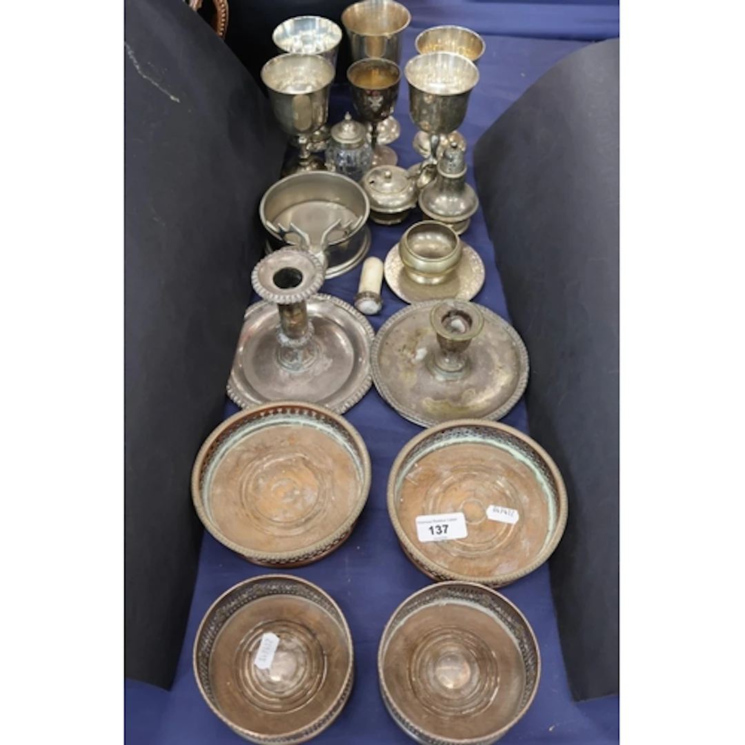 Plated ware comprising goblets, coasters, candlesticks.