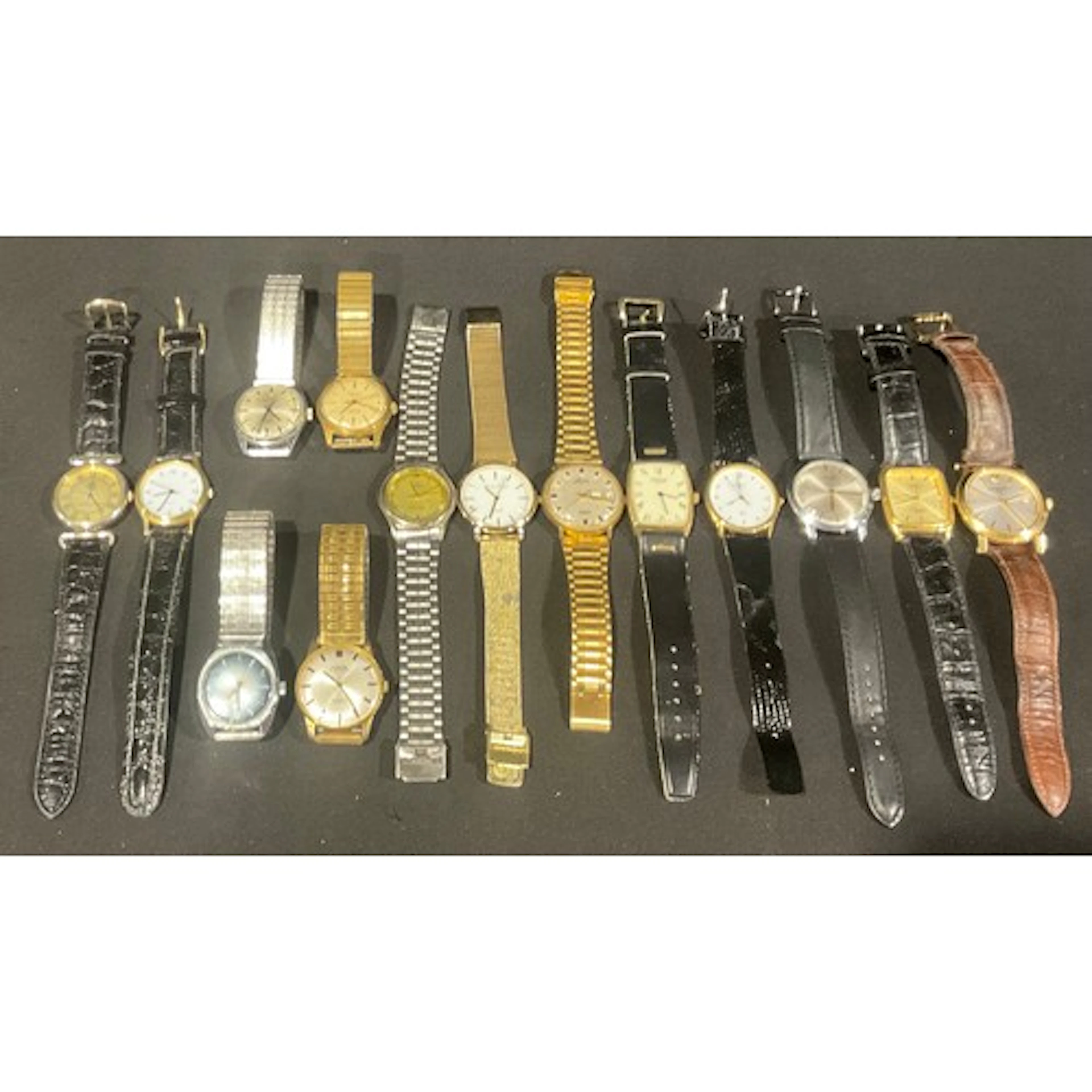 A collection of traditional wrist watches, including Mortima...