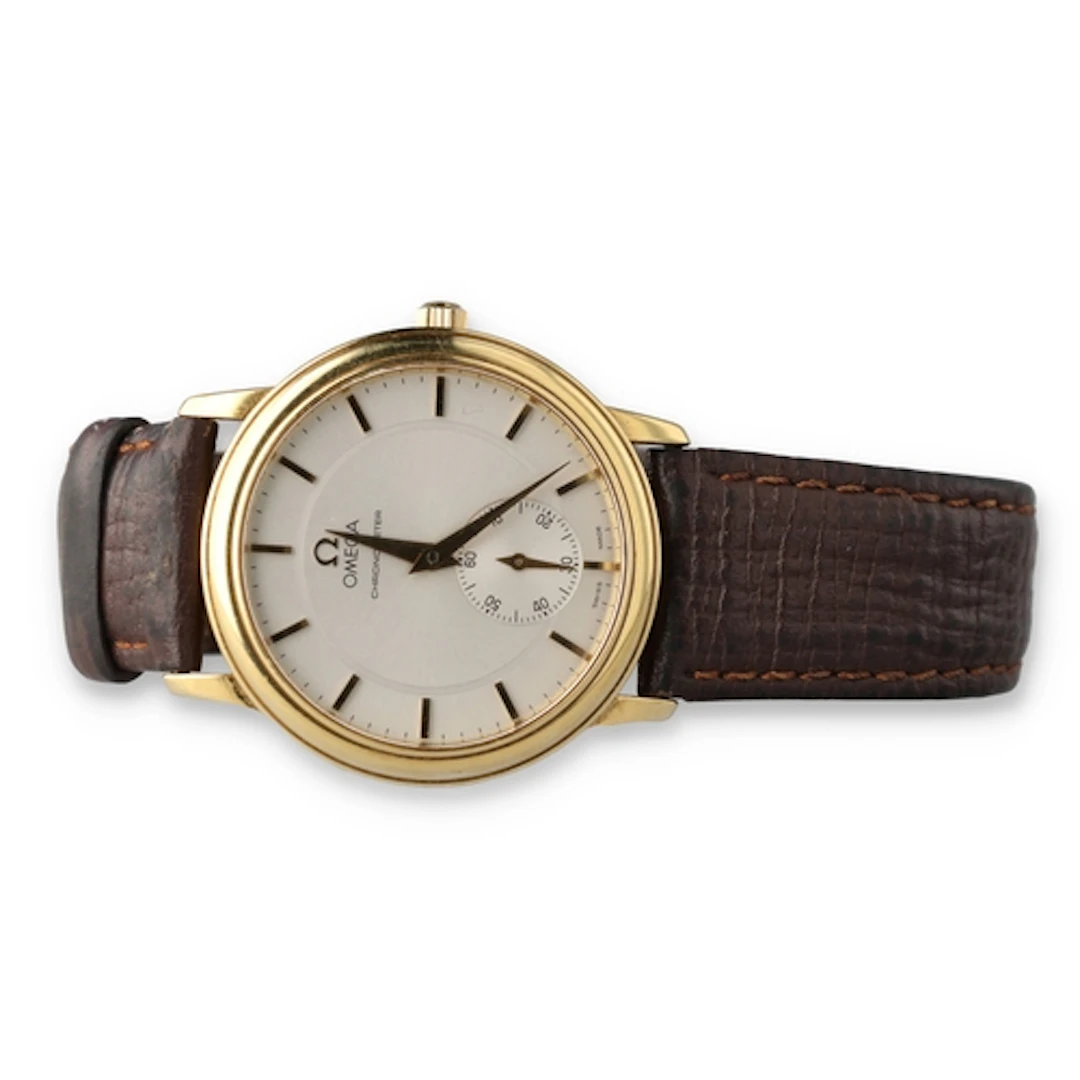 AN 18CT GOLD OMEGA CHRONOMETER WRISTWATCH With circular cham...